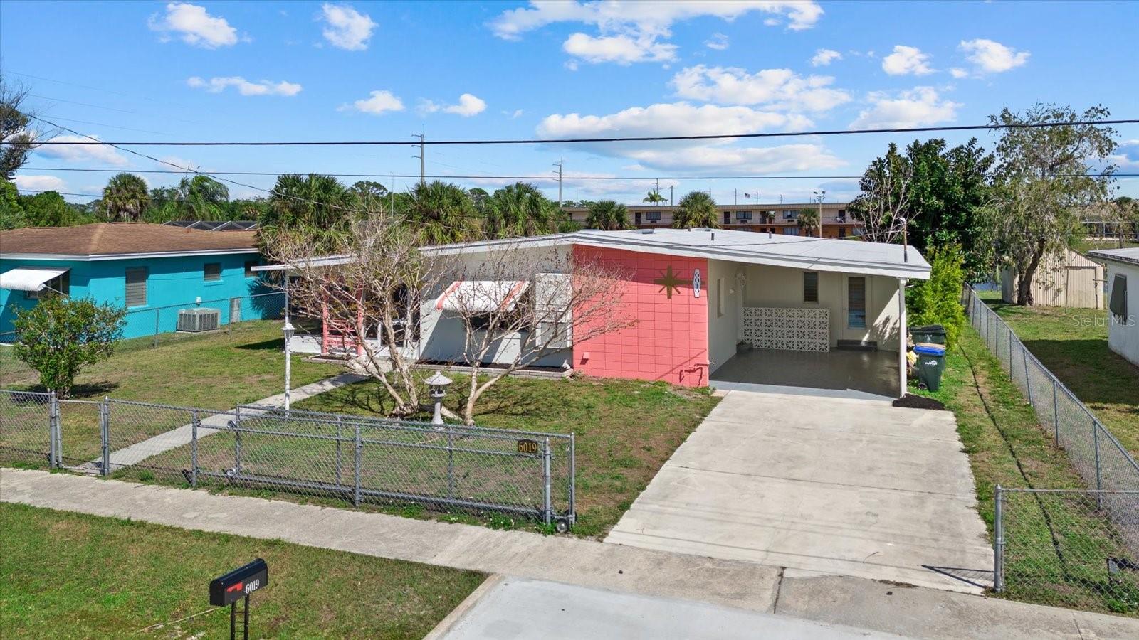 One or more photo(s) has been virtually staged. PRICE IMPROVEMENT! Motivated Seller!
Welcome to 6019 Merril St in North Port—a clean, move-in ready home on a canal lot with a rare combination of character, space, and location, now offered at a new, more attractive price.
Inside, you'll find original terrazzo floors, vaulted ceilings, and a bright, open layout that feels larger than its 1,395 sqft. The updated kitchen features new cabinetry, countertops, and appliances, while both bathrooms have been refreshed for a modern feel.
Beyond the main living area, the home offers a large enclosed Florida room and a screened lanai—providing significant additional space for relaxing or entertaining.
Situated on an oversized .30+ acre lot with canal frontage, the property offers privacy, outdoor space, and a setting that stands out from typical homes in this price range.
Seller has obtained quotes for installation of a new HVAC system and is willing to credit toward the cost with an acceptable contract—giving buyers flexibility while reducing upfront expense.
Conveniently located near US-41, I-75, shopping, dining, Wellen Park, and Gulf beaches.
This is a rare opportunity to get more home and land for less—schedule your showing today before this one's gone.