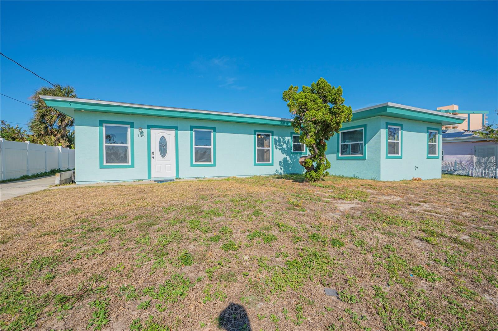 Just steps from the ocean, this beachside oasis offers the perfect combination of coastal living and investment opportunity. Whether you're looking to expand your rental portfolio or secure a future beachside residence, this versatile property is already generating reliable income. The main home features 3 bedrooms, 2 bathrooms, and 1,897 square feet of comfortable living space with a spacious kitchen showcasing granite countertops, rich wood cabinetry, modern appliances, abundant storage, and generous countertops. Conveniently located at the rear of the property is a 352-square-foot detached studio in-law suite with a full bathroom and kitchen providing additional flexibility for rental income, guests, or extended family. Both the main home and the in-law suite received new roofs in 2024, adding long-term value and peace of mind. The property is currently occupied under annual leases, with the main home rented for $2,195 A month and the in-law suite rented for $795 A  month,

providing immediate income for investors. Total current income- $2990

This house is ready to go. Please message listing agent for additional info or to schedule a showing,

*Please do not disturb the tenants. All showings require advance coordination with the listing agent.*