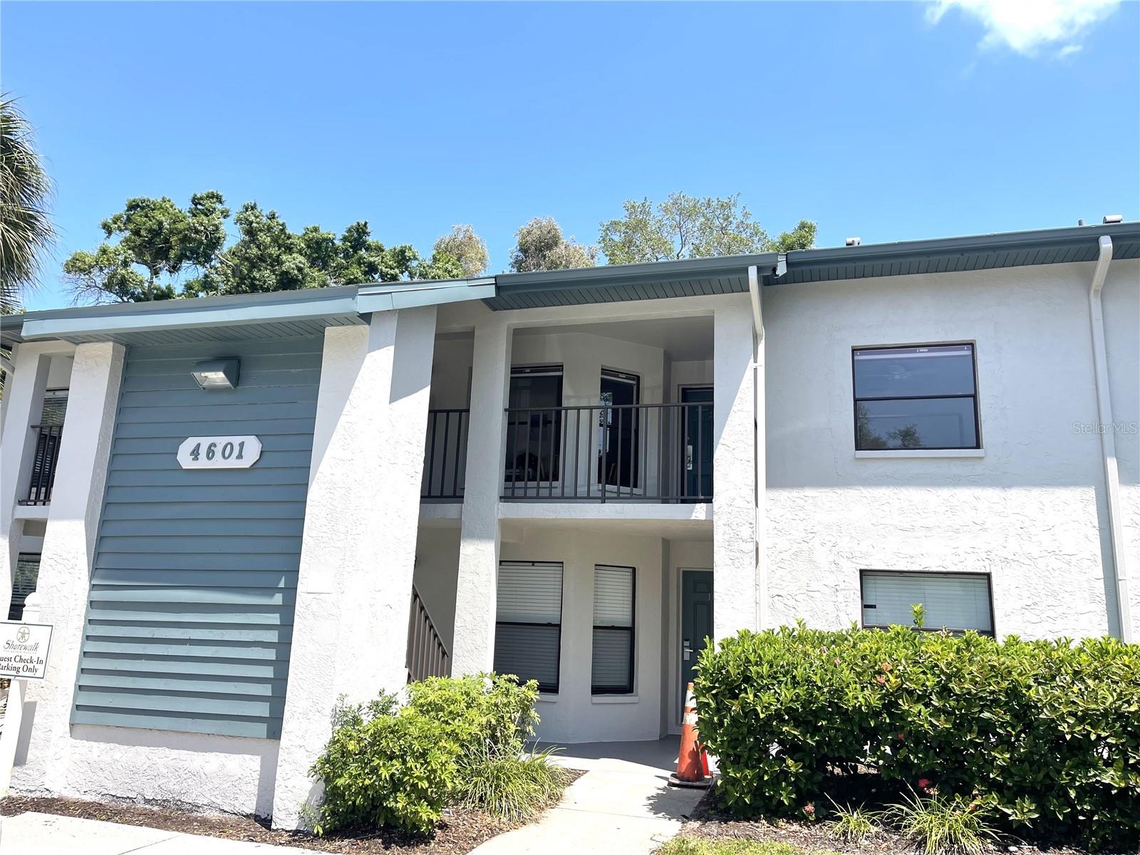 Only 6 miles from Anna Maria Island Beaches. This well maintained condo has never been rented. This condo has an Open floorplan and vaulted ceilings. Both bathrooms have been updated, AC 2024 and roof approximately 3 years old. The eat in kitchen consists of a closet pantry, breakfast nook and pass through to the dining room. The spacious living room, dinning room combo has a wall of sliding doors to the covered screened in lanai. Great for relaxing with your morning coffee or evening drink. The spacious master bedroom consists of sliding doors to the lanai, walk in closet and ensuite bathroom. The second bedroom is spacious and bright. The updated guest bath consists of a tub and shower. Shorewalk is a beautiful community great for investors, second home or primary residence. Shorewalk offers so many amenities to enjoy, two heated pools, spa, tennis courts, pickle ball, basketball court, playground, barbecue area, club house and billiards room and much more. Something for everyone. Very close and walking distance to shopping and restaurants. Close to Anna Maria Island and beaches, Golfing, SRQ airport, downtown Sarasota, and IMG. Fees cover your Cable, Internet, Water, Sewer and trash. This 2/2 condo is in one of the few communities that allow short term rentals. Being sold turnkey furnished and priced to sell, you can manage your own rental or use their onsite management team with two rental programs to choose from.