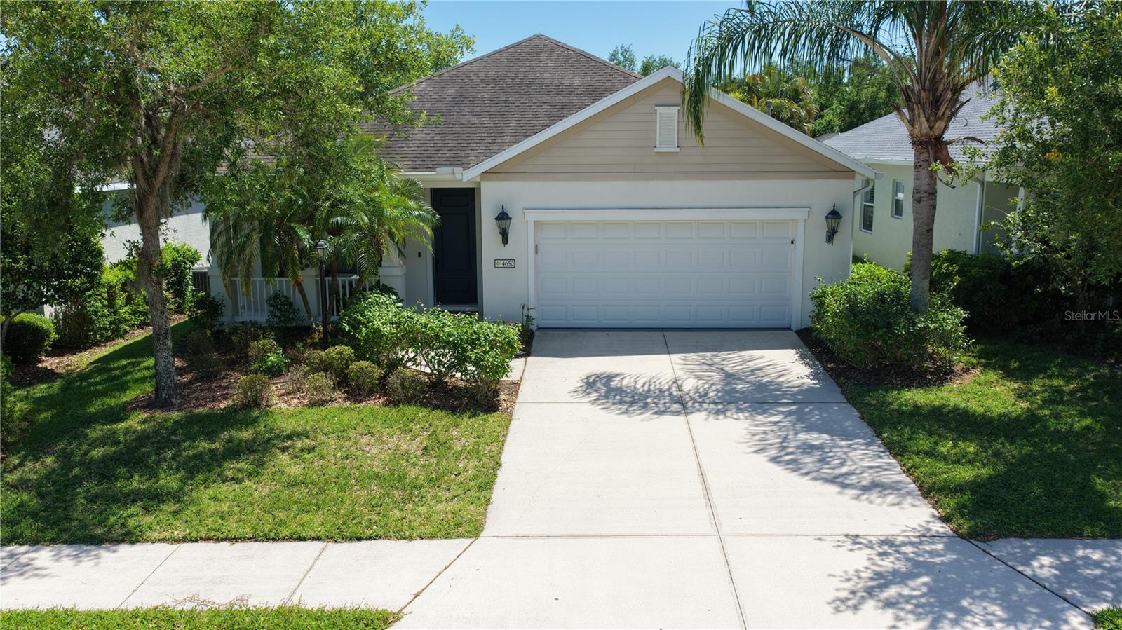 Welcome to the sought-after Woodbrook community in this gated development with private access and resort-style amenities. Just a short walk from the community pool sits this charming traditional Florida home built by Neal Communities.
Step inside to a bright, open floor plan with high ceilings and a spacious kitchen island perfect for morning coffee and family meals. The generous living room provides an ideal space for entertaining and gatherings.
Outside, the backyard has been transformed into a private oasis with vinyl fencing, offering a safe play area for pets. The home backs to a natural preserve that stretches nearly 0.4 miles, delivering peaceful views and added privacy.
Conveniently located, University Town Center is just a 10-minute drive, sandy beaches are approximately 25 minutes away, and downtown Sarasota or Bradenton are about 15 minutes. Easy I-75 access is only 7 minutes away.
This is a wonderful opportunity in a prime location. Come see this lovely home today!
