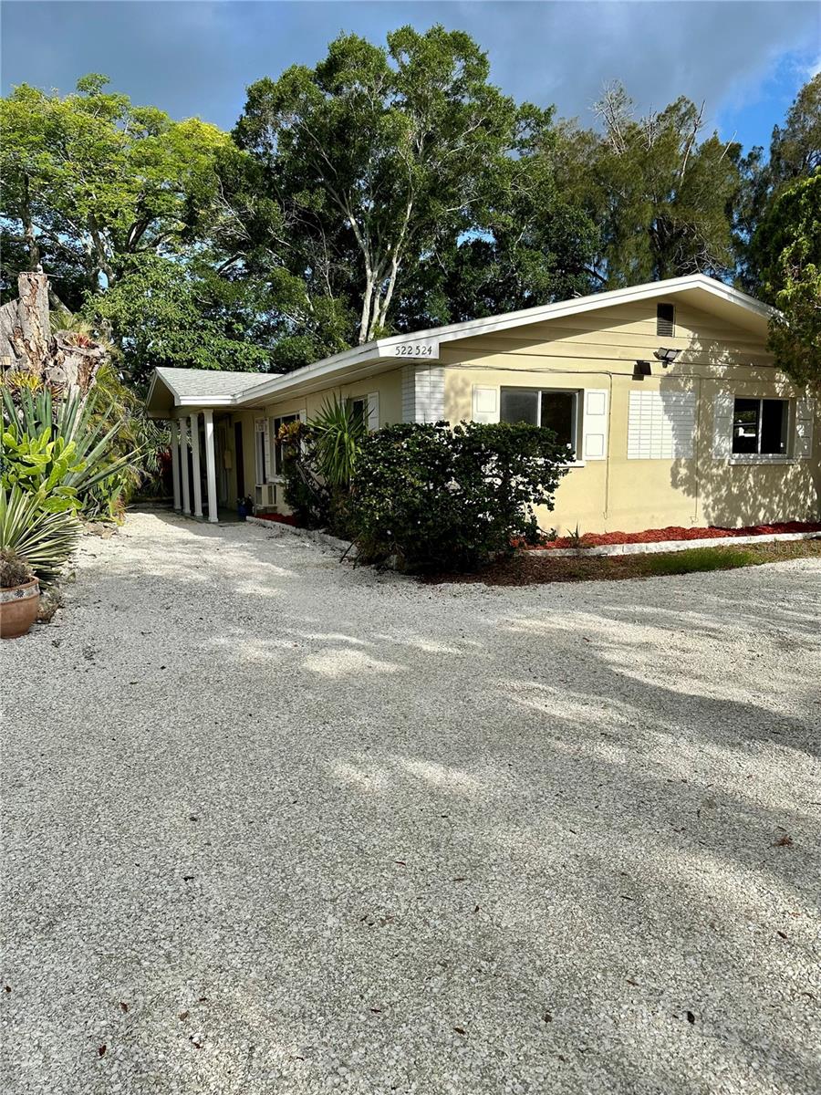 Rare investment opportunity. Adjacent sister property may also be available, offering potential to acquire multiple income-producing units in one location and expanding landmass ownership. Currently available, a beautifully updated duplex in the heart of Clearwater offering an exceptional opportunity for investors and owner-occupants alike. This building would make a great short term vacation rental because of the short drive to the crystal blue waters of Clearwater beach. The property rents quickly if one becomes available because of the location and attractive street that it is on. Unlike many rental properties, this well-maintained building is situated on a charming street lined with attractive homes featuring manicured lawns and pride of ownership is seen throughout the neighborhood. A recently newly constructed home on the street further enhances the area’s appeal and value. Long term stable tenants are in place. Predetermined market rents are gross 39,000 for current listing or 78,000 for both buildings. The property features updated kitchens and bathrooms, including stone countertops, modern cabinetry, and stylish finishes throughout. One unit offers a spacious one-bedroom, one-bath layout with an extra enclosed room that is ideal for a home office, dining area, hobby room, or a small closet could be added for bedroom, making it a 2 bedroom unit. All units have durable ceramic tile throughout. The large kitchen is equipped with modern appliances and includes a generous full pantry with a door, providing abundant storage and functionality. Newer breaker boxes were installed a few years ago. Water and power are separate for all units and paid by the tenant. Ideally located just a short drive from Clearwater’s world-famous beaches, this property enjoys strong rental demand and a proven history of consistent occupancy. The owner can provide a long track record of successful consistent tenant rentals, making this an attractive addition to any investment portfolio.