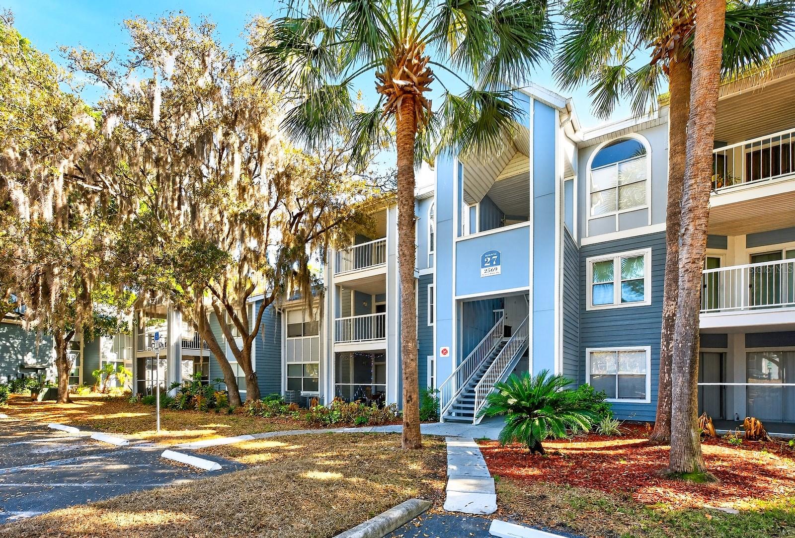WATER VIEWS ~ FANTASTIC AMENITIES ~ AND FRESH UPDATES – this adorable second-floor condo in the Regency Park at Lake Mary community offers the perfect combination of convenience and low-maintenance living in one of Lake Mary’s most desirable locations! ****Major updates include a NEW A/C (2025) for peace of mind, along with LUXURY VINYL PLANK FLOORING throughout (2023), INTERIOR PAINT (2023), and UPDATED LIGHT FIXTURES and shower fixtures that give the space a modern, move-in ready feel. The OPEN CONCEPT layout creates an easy flow between the living, dining, and kitchen areas, making the home feel bright and inviting. Sliding glass doors lead to a private BALCONY with peaceful WATER VIEWS, the perfect spot for morning coffee or relaxing evenings. Even better, the balcony is accessible from both the living room and the bedroom, allowing you to enjoy the water views from multiple spaces. Set within the waterfront community of Regency Park at Lake Mary on Greenwood Lake, residents enjoy a beautifully landscaped, park-like setting with mature trees and exceptional amenities. This GATED COMMUNITY features TWO POOLS, a fitness center, tennis courts, playground, laundry facilities, dock on Greenwood Lake and at Reflection Park, a COMMUNITY BOAT RAMP, and more – offering plenty of opportunities for recreation and relaxation just steps from your front door. The central Lake Mary location places you close to everything with easy access to I-4, plus a wide variety of nearby shopping and dining options. Whether you are looking for a first home, investment property, or a low-maintenance Florida lifestyle, this charming condo delivers comfort, convenience, and beautiful water views all in one. Call today to schedule a tour! **Seller may consider buyer concessions if made in an offer**