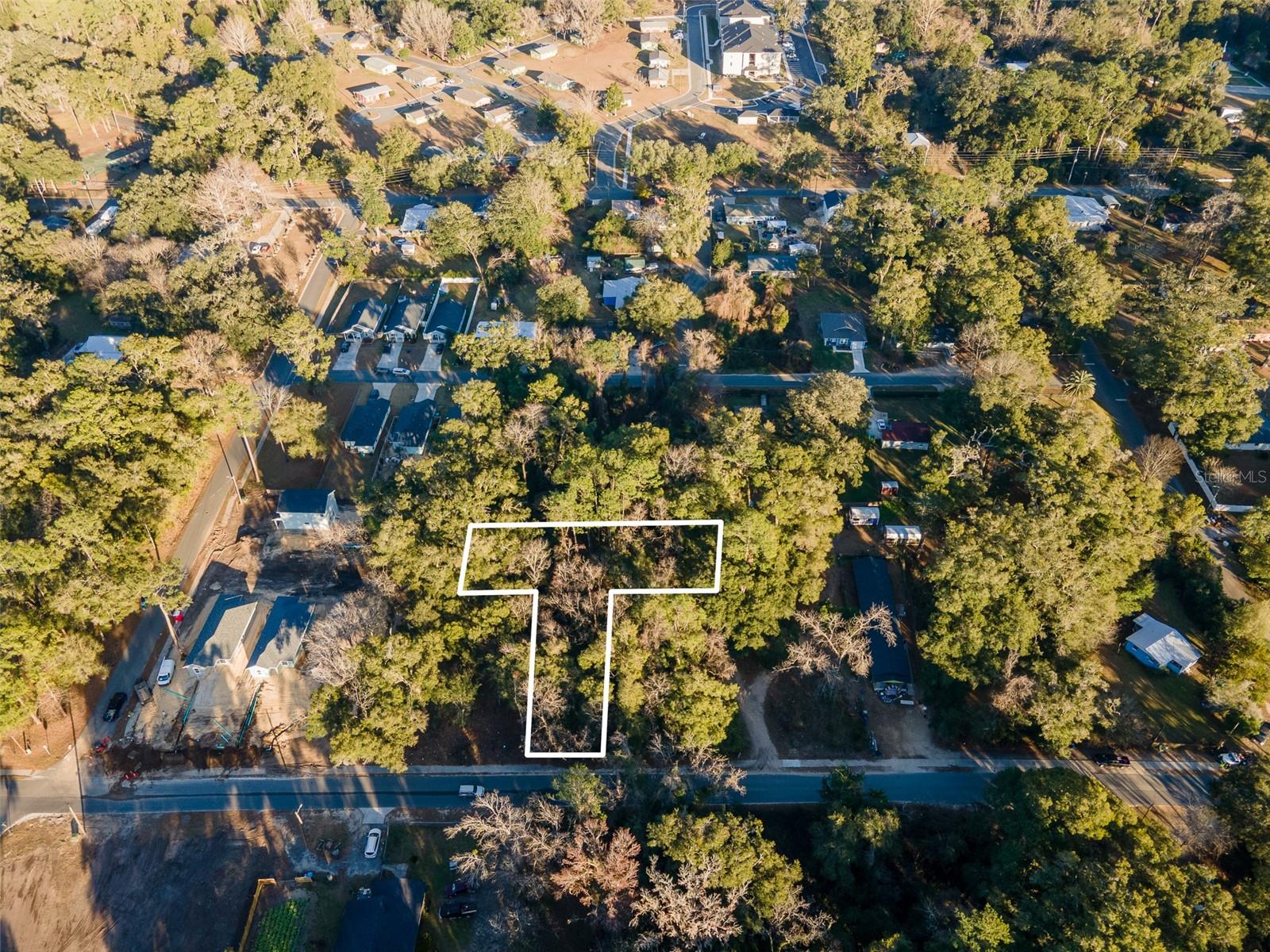 WELLS ADD TO ALACHUA - Land