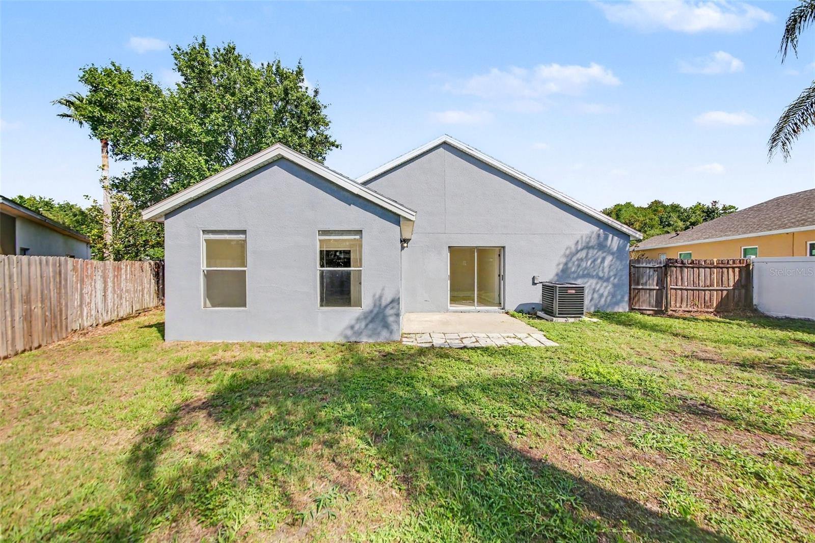 This 3-bedroom, 2-bathroom single-story home offers a durable and functional foundation, featuring an attached 2-car garage and a completely carpet-free interior with tile flooring throughout the entire home. The layout begins with a spacious living room and dining room combo at the front, perfect for versatile furniture arrangements and entertaining. The kitchen is already updated with premium granite countertops and includes a full suite of well-maintained appliances in good working condition. While the property needs some TLC and, its high-value features—like the stone counters and easy-to-maintain tile—make it an excellent opportunity for a buyer looking to build quick equity through cosmetic updates.