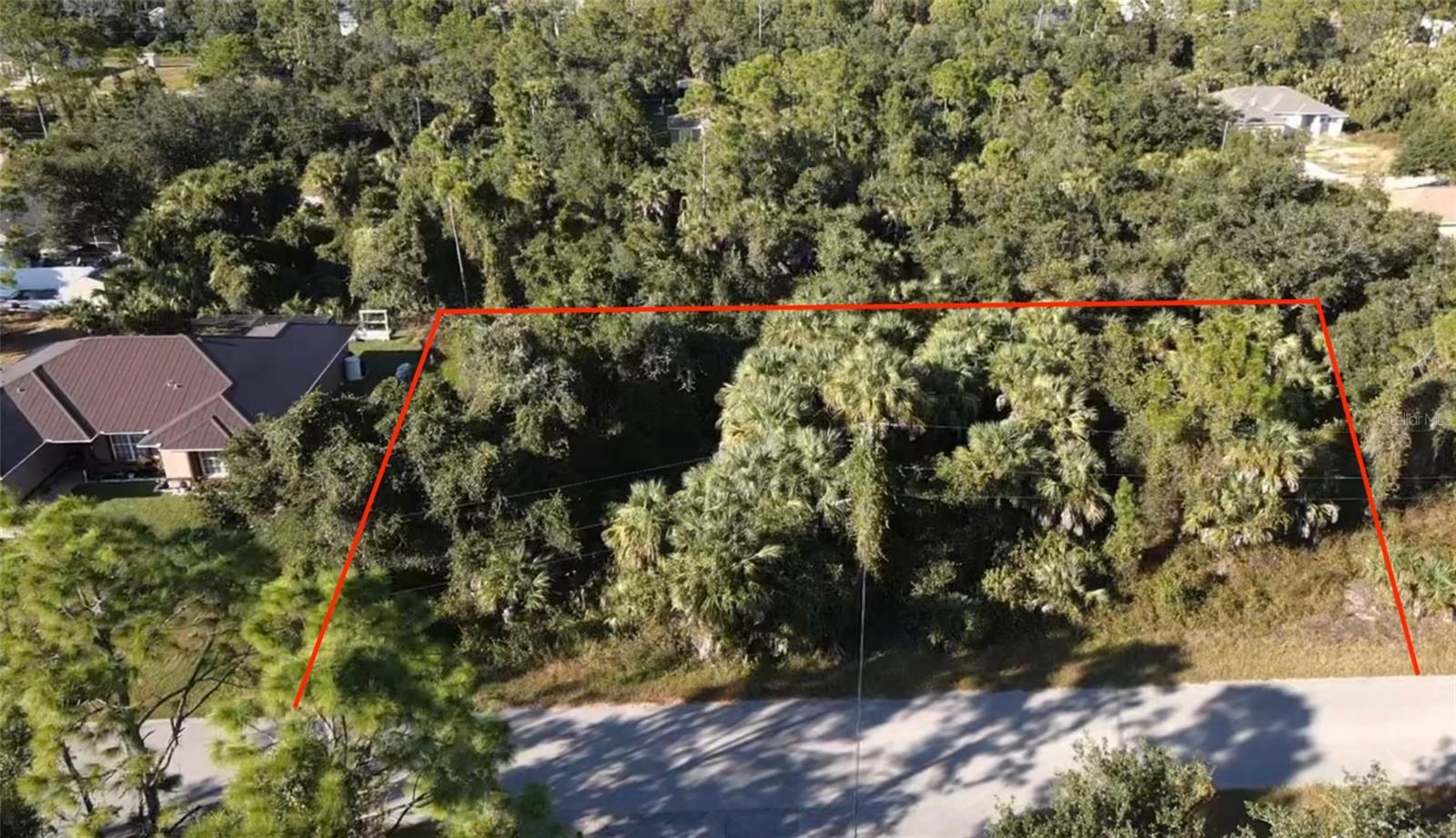 Rare opportunity to own a spacious double lot—nearly half an acre—on Countess Avenue in North Port. This oversized property offers exceptional space, flexibility, and value for your next Florida build. Whether you are planning your dream home, investing for the future, or envisioning a property with multiple structures, this expansive lot provides endless potential and a beautiful canvas to bring your vision to life.
Located in a non-flood zone and outside of any scrub-jay habitat, this property offers peace of mind with smoother permitting, fewer building restrictions, and more predictable insurance costs. The surrounding area provides the perfect balance of privacy and convenience, making it ideal for both full-time residents and seasonal homeowners. North Port continues to be one of Southwest Florida’s fastest-growing cities, celebrated for its peaceful neighborhoods, natural beauty, and proximity to Gulf Coast beaches and attractions.
Just minutes away, residents can enjoy Atwater Community Park, Blue Heron Park, and Butler Park, all offering playgrounds, open spaces, and sports facilities. Outdoor enthusiasts will appreciate the miles of freshwater canals throughout the city and easy access to the Myakka River and Myakka State Forest for hiking, biking, kayaking, and wildlife viewing. The famous Warm Mineral Springs Park is also nearby—a one-of-a-kind natural landmark known for its warm, therapeutic waters and year-round recreation. For everyday convenience, the area provides quick access to grocery stores, dining options, schools, and popular shopping destinations such as Cocoplum Village Shops. Major roadways, including I-75, are just a short drive away, connecting you easily to Sarasota, Venice, and Port Charlotte.
With nearly half an acre of level, buildable land, there is plenty of room to design a spacious custom home with an expansive lanai and pool, a detached garage or workshop, or an RV or boat storage area. You could also add a guest house or in-law suite, create lush tropical landscaping, or develop a private backyard oasis complete with gardens, outdoor entertaining spaces, and mature shade trees. Oversized lots like this are increasingly rare in North Port and offer a lifestyle of space, privacy, and long-term value that smaller parcels simply cannot match.
This property stands out for its size, location, and versatility—offering the freedom to build when you are ready and the opportunity to create something truly special in a desirable and growing community. Whether you envision a modern family retreat, a private compound, or a smart long-term investment, this oversized double lot on Countess Avenue delivers the perfect foundation for your next chapter in beautiful North Port, Florida.