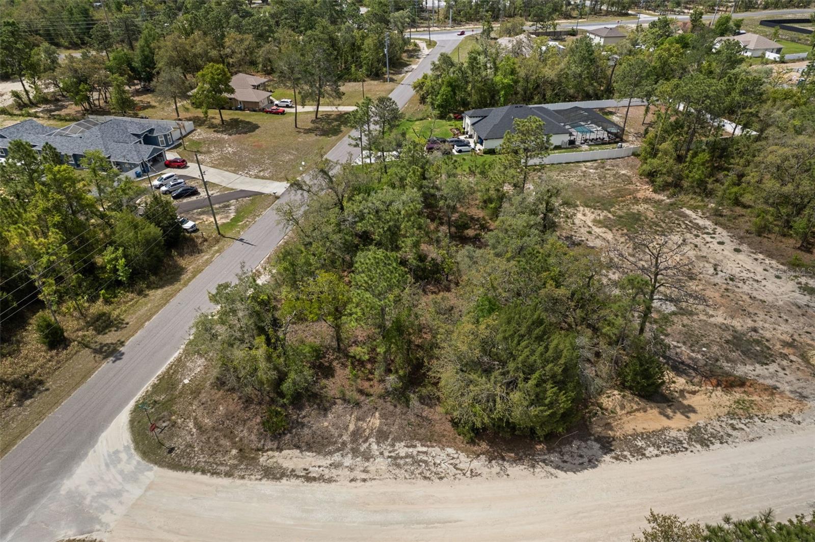 SPACIOUS CORNER LOT READY FOR YOUR DREAM HOME! This .55-acre residential vacant parcel offers over half an acre of opportunity to design and build the home you’ve always envisioned. Situated on a desirable corner lot, this property provides added flexibility for home placement, driveway access, and outdoor living space. Enjoy the convenience of being close to shopping, restaurants, and hospitals while still having plenty of room to create your own private retreat. Don’t miss this chance to secure a generously sized homesite in a convenient location! Parcel# R01 221 17 3340 0285 0090 or Key# 00702350