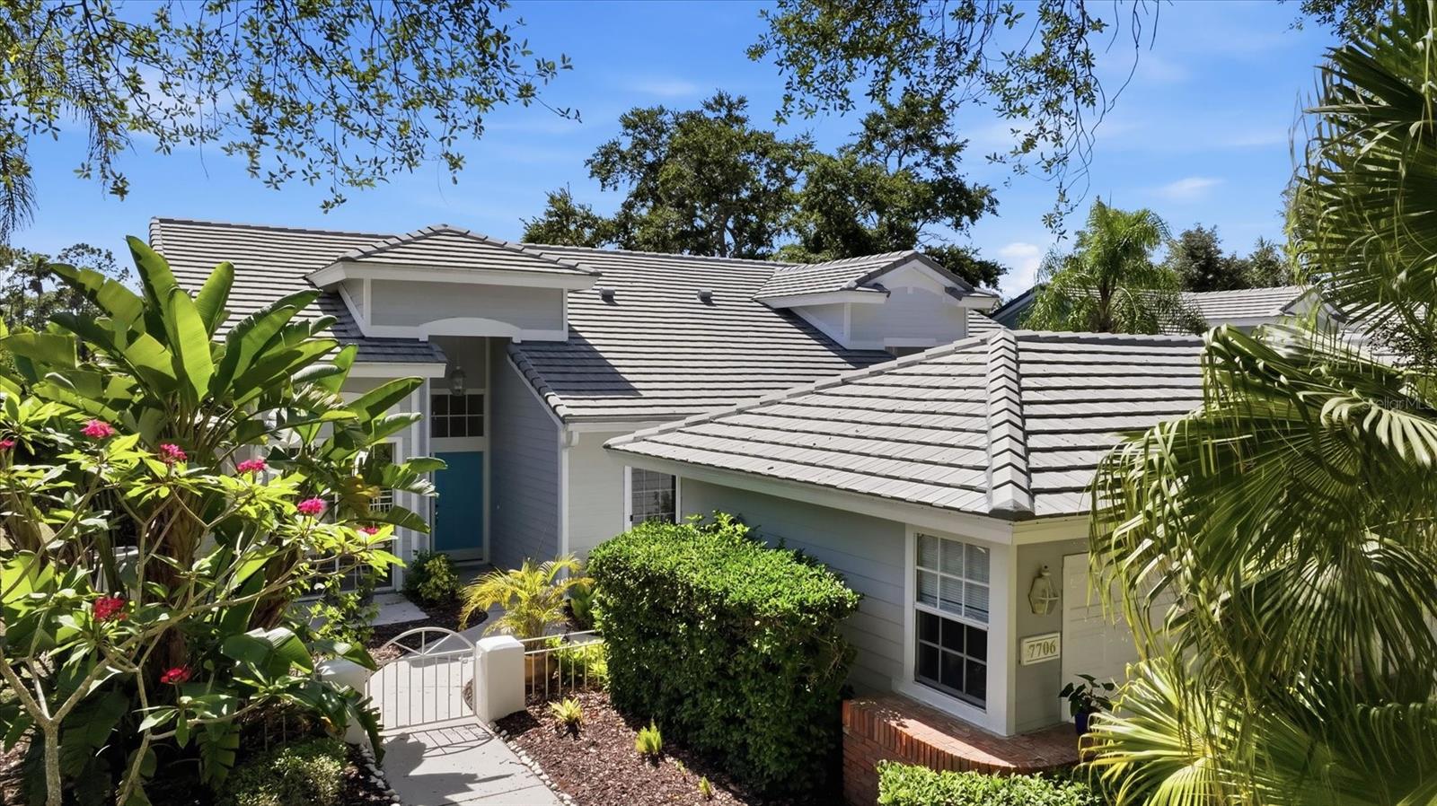 Welcome to University Park Country Club! With its mature landscaping and sprawling natural beauty, University Park is one of the premier master-planned communities in the Sarasota area. Behind the secured, staffed entrance is an award-winning, resident-owned community featuring 27 holes of four-star rated golf, eleven lighted Har-Tru tennis courts, four pickleball courts, a fitness center, croquet, miles of tree-lined streets for walking or biking, and first-class dining. Residents also enjoy numerous social activities and clubs designed to fit a wide variety of interests.

Located only four miles from downtown Sarasota and its vibrant arts community, museums, shopping, dining, and world-class healthcare, University Park offers a peaceful oasis while remaining close to everything Sarasota has to offer. It is also just a short 15-minute drive to some of America’s finest beaches, outstanding outdoor recreation areas including the internationally renowned Nathan Benderson Park, the famed Ringling Museum, boating opportunities, and the acclaimed St. Armands Circle.

From the moment you walk in, you will be captivated by the gorgeous lake views. The enclosed lanai will quickly become your favorite place to relax, enjoy the sunshine, and watch the abundant wildlife. High ceilings throughout the villa create an open and spacious feeling. The large primary suite features a walk-in closet and oversized vanity, while the guest suite is conveniently located on the opposite side of the home, providing privacy for everyone.

This maintenance-free community includes approximately 150 TV channels and WiFi service. The community pool is just a few steps away and is large enough for lap swimming and water exercise. Recently installed ROOF (2021) and AC system (2020) provide additional peace of mind.