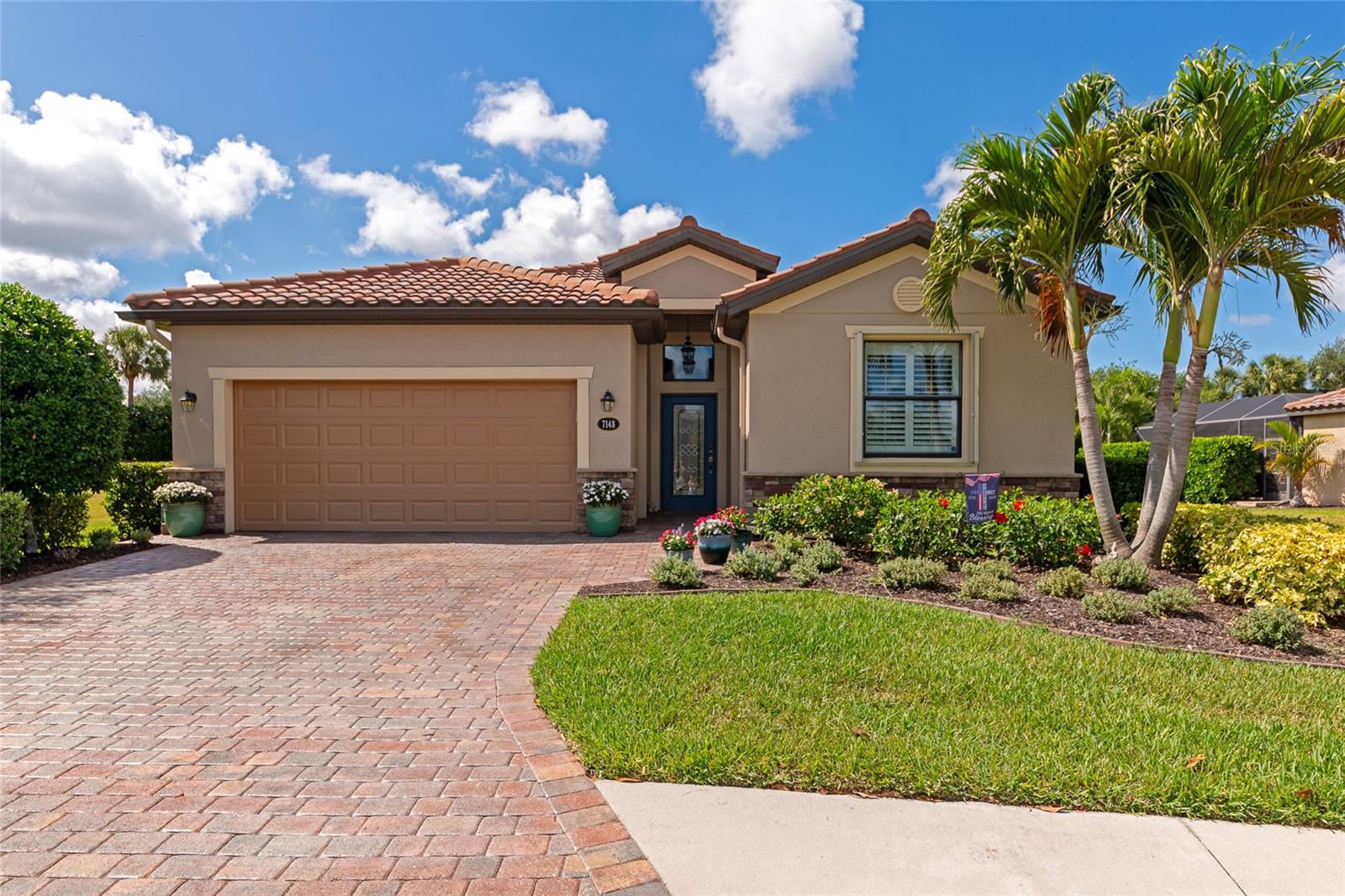 Welcome home to the beautiful Gated Resort Community of River Strand Golf and Country Club. You won’t want to miss this meticulously cared for home in the Sanctuary of River Strand. This popular and rarely available Trevi model is move-in ready with 4 bedrooms and 3 baths, has been meticulously cared for, and shows pride of ownership. The sellers have added over $100,000 in upgrades and enhancements to this property and are feeling sad to be moving, but they must relocate. They have priced this home to sell quick. The minute you enter the home, you are welcomed into the Large main area with it's Great Room and Dining Area. Both open to a spacious Kitchen with an Extended Large Island, New Granite Countertops, Custom Backsplash, Professionally Painted Cabinets, Gas Range, Large Walk-in Pantry, and an Abundance of Cabinets and Countertop. This home is equipped with Plantation Shutters throughout. The sliders from the living room lead to a screened lanai that's perfect for relaxing  and entertaining. The private Master Suite is towards the back of the home and features Crown Molding, 2 large Walk-in closets equipped with Closet Organizers, and a Roomy En-suite Bath. The Master Bath includes Dual Sinks and a separate shower and Soaker tub. The most recent updates include a Custom Counter with Dual Sinks in Master Bath, Interior and Exterior Painting, Re-Screening of the Lanai with No-Seeum screen and a New Hot Water Heater. The home is equipped with easy to close Accordion Hurricane Shutters attached to the outside of the home and an Electric Hurricane Shade in both the lanai and front entryway making it easy to prepare for any potential weather. This beautiful home in the Sanctuary area comes with a transferable Social Membership which is included in the low HOA fee. The Association also provides lawn and yard maintenance, cable TV, internet service and irrigation water. River Strand is a 24hr Gated community that offers two Clubhouses, a Newly Remodeled Fine Dining Restaurant and Bar & Grill Room, a Newly Remodeled Tiki Bar, 2 Resort Style Pools and 6 Community Pools, 8 Har-Tru Tennis Courts with on-site Tennis Pro Shop, 2 modern Fitness Centers, 8 Pickle Ball Courts, Library, Conference Room, Fitness Classes, a Dog Park nearby, Special Events, Live Music and Concerts and so much more. The 39,000 sf main clubhouse offers fine dining in the restaurant, casual dining in the Bar and Grill room and food and beverages in the pool Bar area. The community also features a 27 hole championship golf course designed by world renowned architect Arthur Hills! Conveniently located near I-75, this home offers a quick commute to University Town Center Mall, Ellenton Premium Outlets, St Pete Beach, Sarasota, Venice, Tampa Airport, Sarasota Airport and the famous beaches of sunny Florida’s Gulf coast. Welcome to living the Florida dream!