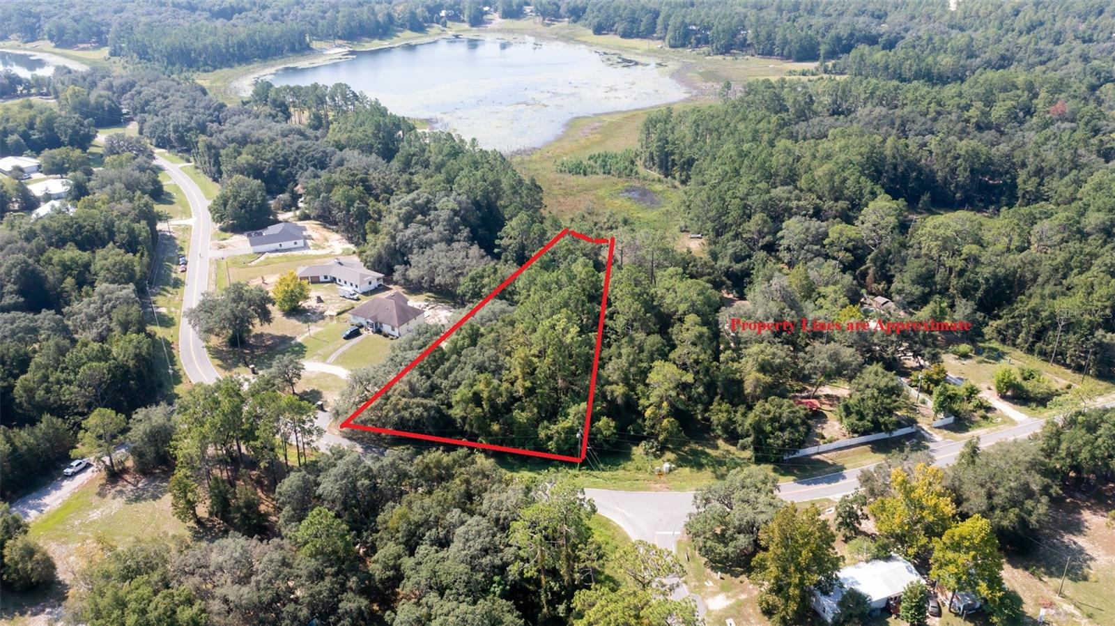 Waterfront lot for homes or modular homes only. Paved road frontage.