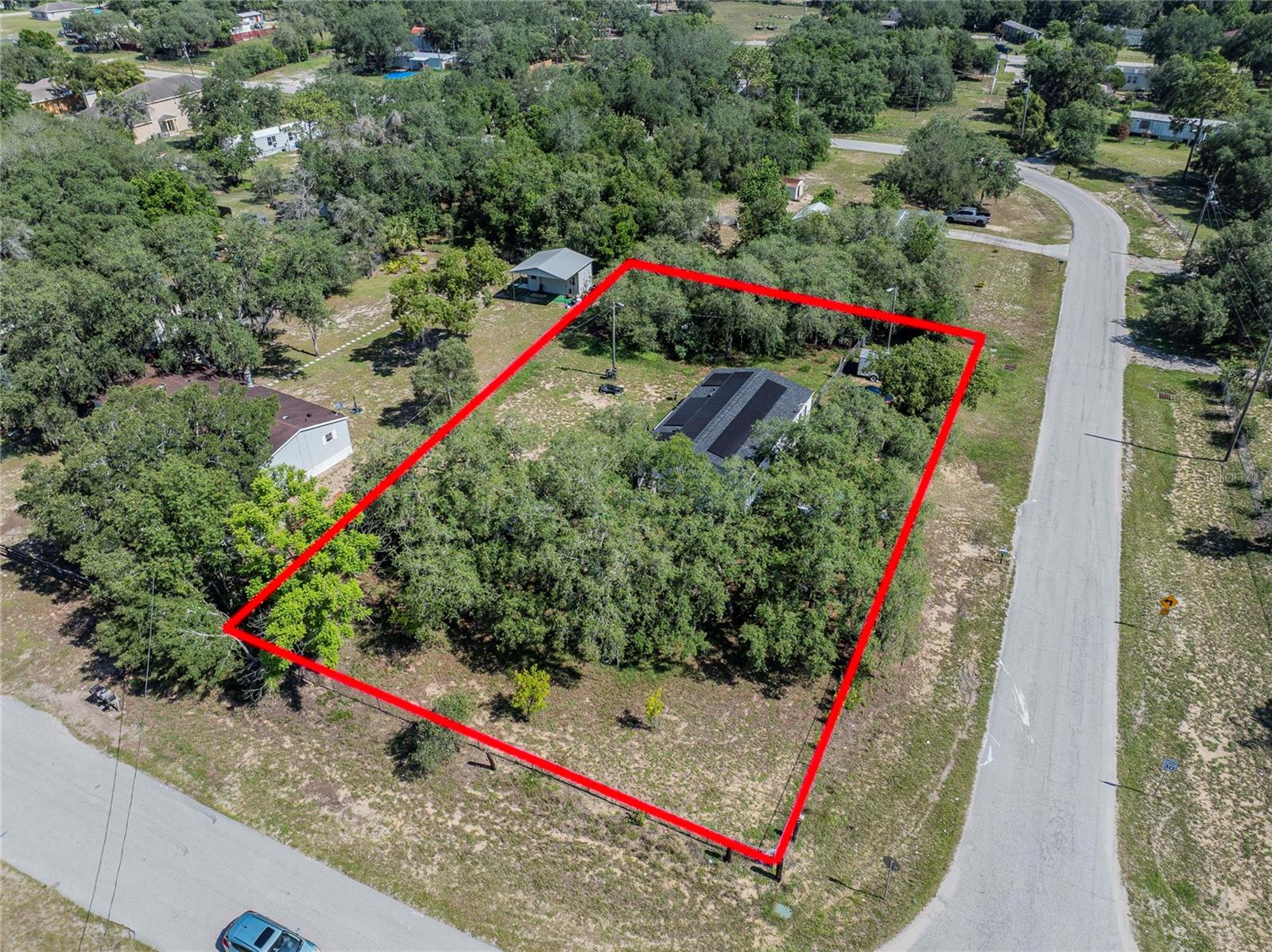 Welcome to peaceful country living in Lake Wales! Situated on just over half an acre, this beautifully renovated 3-bedroom, 2-bath manufactured home offers the perfect blend of rural charm and modern convenience. Inside, you'll find an inviting open floor plan with updates completed in 2023, creating a bright and functional living space ideal for everyday living and entertaining.  Enjoy peace of mind with a roof and water heater that are both only 3 years old. The home sits on a spacious corner lot and features a fully fenced yard, providing plenty of room for pets, gardening, or outdoor activities. With no HOA, there's ample space to park your boat, RV, trailers, and all your toys.  Located in a quiet rural setting, you're still just a short drive from shopping, dining, and entertainment. Outdoor enthusiasts will love being close to Lake Pierce, a 3,856-acre freshwater lake known for its excellent fishing and public boat ramp access. Don't miss this opportunity to enjoy space, freedom, and country living with modern updates!
