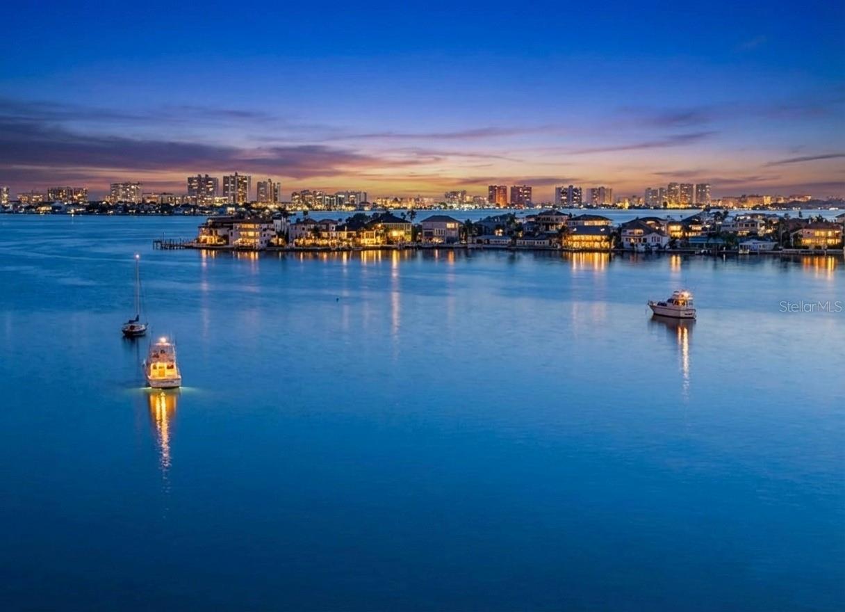One or more photo(s) has been virtually staged. Price Adjustment WAY BELOW appraisal . Wake up to sweeping Clearwater Bay views from this top-floor 2-bedroom, 2-bath residence in the highly sought-after Harbour Club C. With water views from every room and a glimpse of the Gulf beyond, this light-filled home offers the opportunity to enjoy one of Belleair Bluffs' most desirable waterfront locations at an attractive value. Designed for easy coastal living, the condo features hurricane-impact windows, an updated A/C system, assigned parking, private storage, and spacious living areas filled with natural light. The functional floor plan provides an excellent foundation for buyers who want to move in immediately while adding their own personal touches over time. Beyond the residence itself, Harbour Club C stands apart for its financial strength and exceptional management. Fully funded reserves for 2026, completed Milestone and Reserve Studies, building flood insurance, and cable and internet, trash and water included in the HOA provide confidence and predictability that many buyers are seeking in today's condominium market. A full-time on-site maintenance professional and experienced portfolio property manager help ensure the community remains beautifully maintained and professionally operated. While this residence does not include a private balcony, residents enjoy access to a spacious waterfront community dock—an ideal setting for morning coffee, fishing, dolphin watching, or taking in spectacular sunsets over Clearwater Bay and the Causeway Marina. Recent availability within the community reflects a unique market opportunity rather than concerns with the building, giving buyers a rare chance to secure a home in this established waterfront community. Surrounded by million-dollar waterfront homes and located just minutes from Clearwater Beach, Sand Key Park, Belleair Beach, shopping, dining, marinas, and everyday conveniences, this location delivers the best of Florida's coastal lifestyle. If you've been searching for a waterfront home with exceptional views, strong community finances, and the opportunity to add your own style and value, this Harbour Club C residence deserves a place at the top of your list. Schedule your private showing today and discover the beauty of waterfront living for yourself. Seller motivated and will consider reasonable offers.