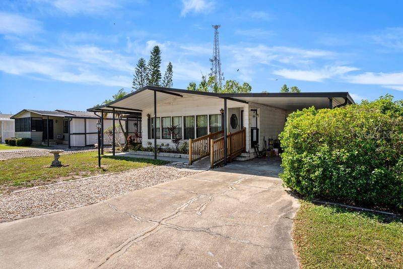 NO FLOOD ZONE. NO LOT RENT-YOU OWN THE LAND AND YOUR HOME-LOW HOA. This home is in the sought-after Sheldon West Community known for its location near Westchase and Citrus Park area. It is a 55+, pet and golf cart friendly well-maintained park and it is a short walk to the Community Pool and the Club House. This home is offering 3 bedrooms and 2 bathrooms and has an indoor laundry room for your convenience. You will find many upgrades including: Roof 2025, water heater 2021. The A/C 2014, plumbing upgrade 2019. All appliances are in good working order.  The open Living room with a fire place, dining room, kitchen, front porch and a large Florida Room make an awesome place to entertain your family and friends. You will feel the warm Florida Sunshine feeling with all the natural lighting you will have as you enter the home. There is a large community pool and club house, shuffleboard and your own community dock overlooking the lake to enjoy the SUNSETS. You will be close to shopping, restaurants, entertainment, Medical Centers and more. This home is waiting for you. 
The property information provided here is for reference only and is not guaranteed to be accurate. It is the buyer's responsibility to verify all property information.