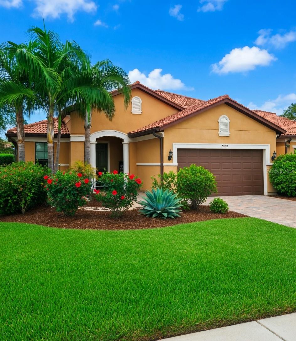 Priced to sell at $539,900! Picture yourself living in this desirable Martin Ray floor plan in the gated IslandWalk community at Wellen Park. This low-maintenance 2-bedroom plus flex/office, 2-bath home with 2,108 square feet is made for easy, enjoyable Florida living.
You’ll love the bright, open layout and chef’s kitchen — perfect for cooking up great meals and entertaining without any fuss. The living areas flow seamlessly out to a spacious western-facing lanai, where you can relax and take in those beautiful Florida sunsets every evening.
IslandWalk delivers resort-style amenities including multiple pools, a modern fitness center, tennis and pickleball courts, and a vibrant clubhouse with an active social calendar. Best of all, it’s an excellent, quiet, and genuinely friendly neighborhood with beautifully landscaped grounds and a real sense of community.
Conveniently located near shopping, dining, golf, and the beaches, this home gives you the lifestyle you want with very little upkeep.
Do not miss your opportunity to make it yours. Schedule your private showing today!