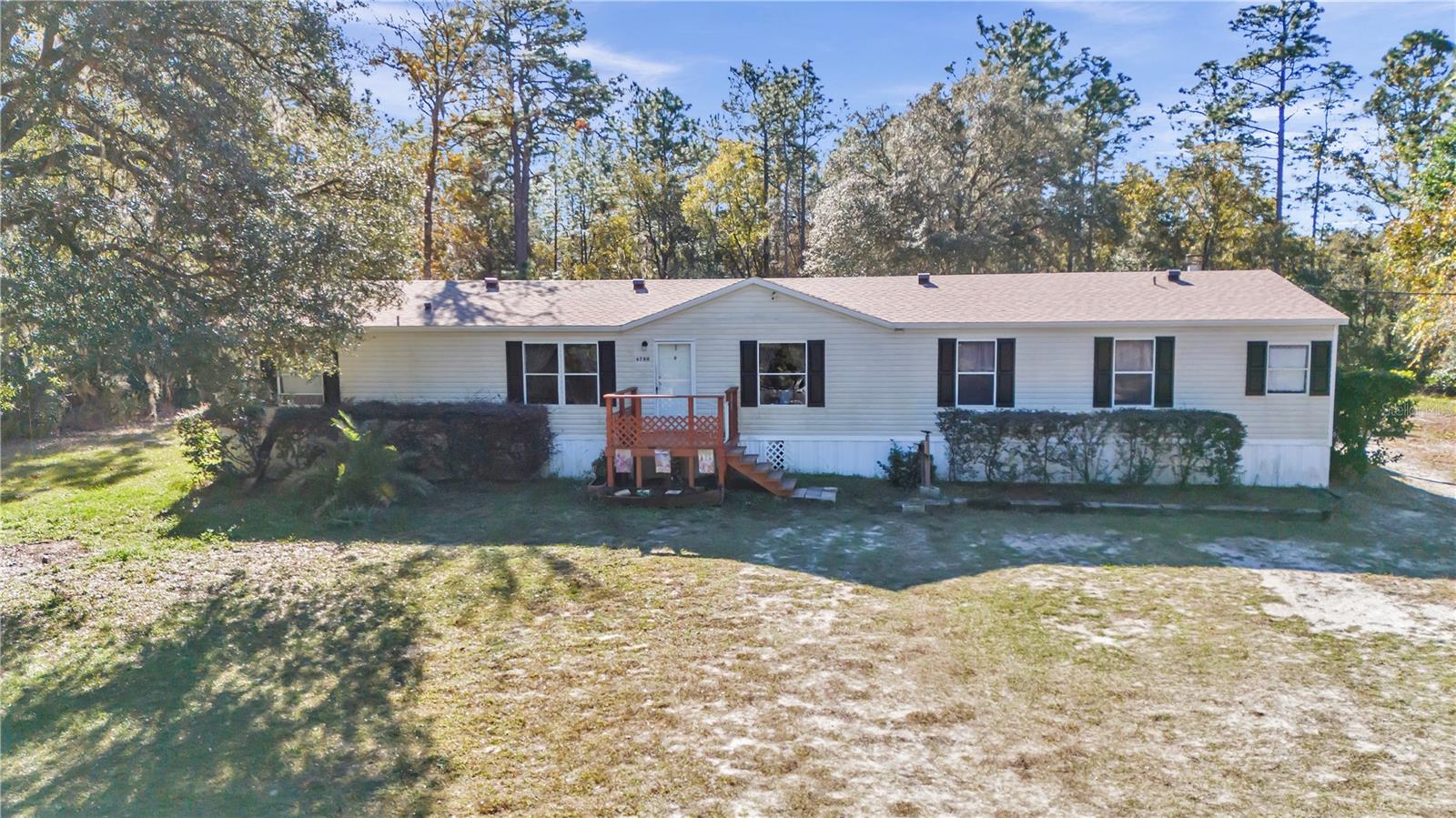 TURN KEY READY!! Beautiful 2002 Manufactured home, 2022 roof, AC is 4 years old, Septic pumed in 2022, Rare find with 1.25 acres in the desirable Marion Oaks Community. Beautiful Spacious 4 Bedroom, 2 bath, with 2 sheds MOVE IN READY!! The home is immaculate and very well-kept. Come Enjoy the Peace & quiet