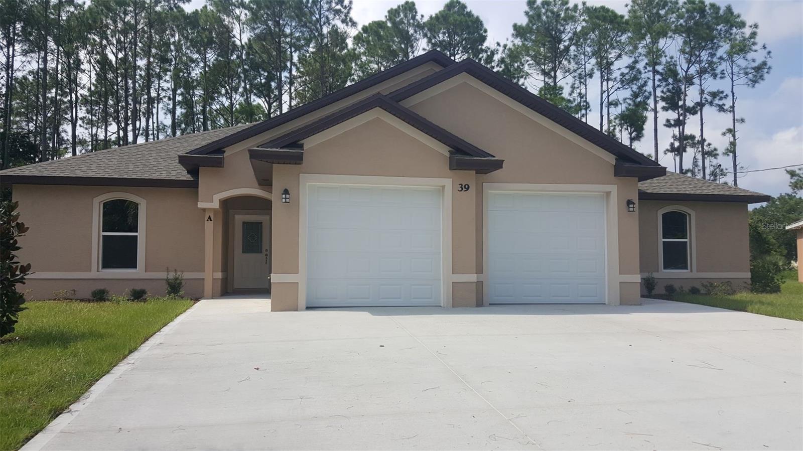 Gorgeous 1188 sqft Duplex, Unit A: spacious 3 bedrooms with walk-in closets, 2 baths, screened and covered Porch, and 1 Car garage with garage door opener system. The large kitchen, all stainless-steel appliances, 42-inch kitchen cabinets with granite counters, and lots of storage space. High tray ceilings, and custom tile throughout. Bathrooms have high-top vanities with cultured marble countertops. Two-car wide driveway for each unit. Available now. Perfect Location: close to schools, shopping, sports complex with pool, churches, and beaches.