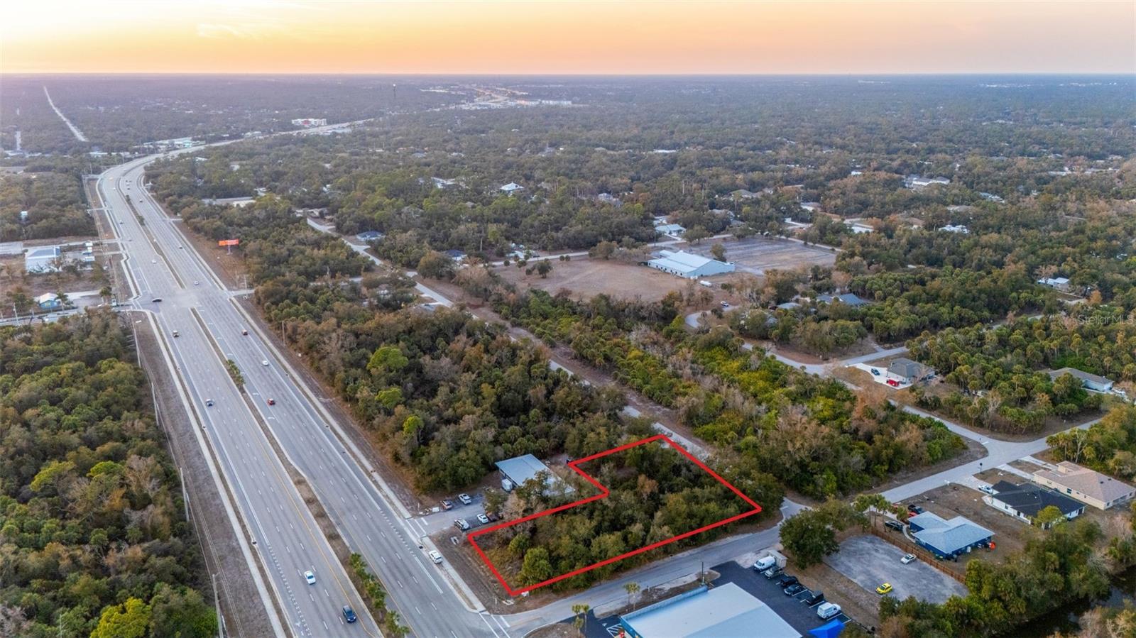 Prime Commercial General zoned parcel located on highly traveled US 41 Tamiami Trail in Charlotte County. This .85 acre property offers approximately 110 feet of direct highway frontage, providing excellent visibility and exposure for a wide range of commercial uses. Commercial General zoning allows for retail, professional and medical offices, restaurants, service businesses, and other highway oriented commercial opportunities. The location benefits from strong daily traffic counts and convenient access to surrounding residential neighborhoods, businesses, and major corridors. With nearly one acre of land, this site offers flexibility for development, on site parking, and prominent signage along one of the area’s primary commercial arteries. Ideal for owner users, investors, or developers seeking a high visibility location in a growing Southwest Florida market.