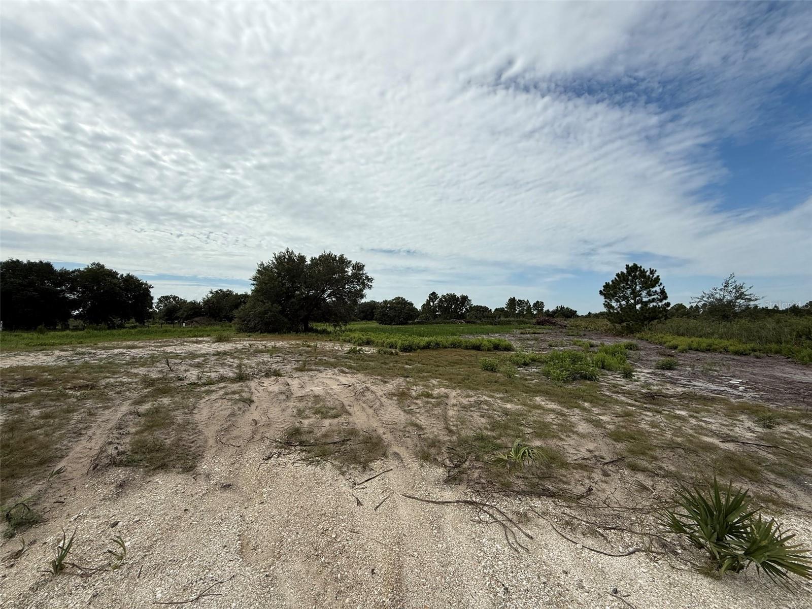 Build your dream home or invest in Florida land with this beautifully cleared property located in Okeechobee! This spacious parcel is ready for your vision, featuring a culvert already in place for easy access. The lot offers a clean slate with plenty of room for a custom home, mobile home, or recreational use. Enjoy the peace and privacy of country living while still being within a short drive to town for shopping, dining, and everyday conveniences. Whether you’re looking to build now or hold for the future, this property is a great opportunity. Buyer to perform their own due diligence.