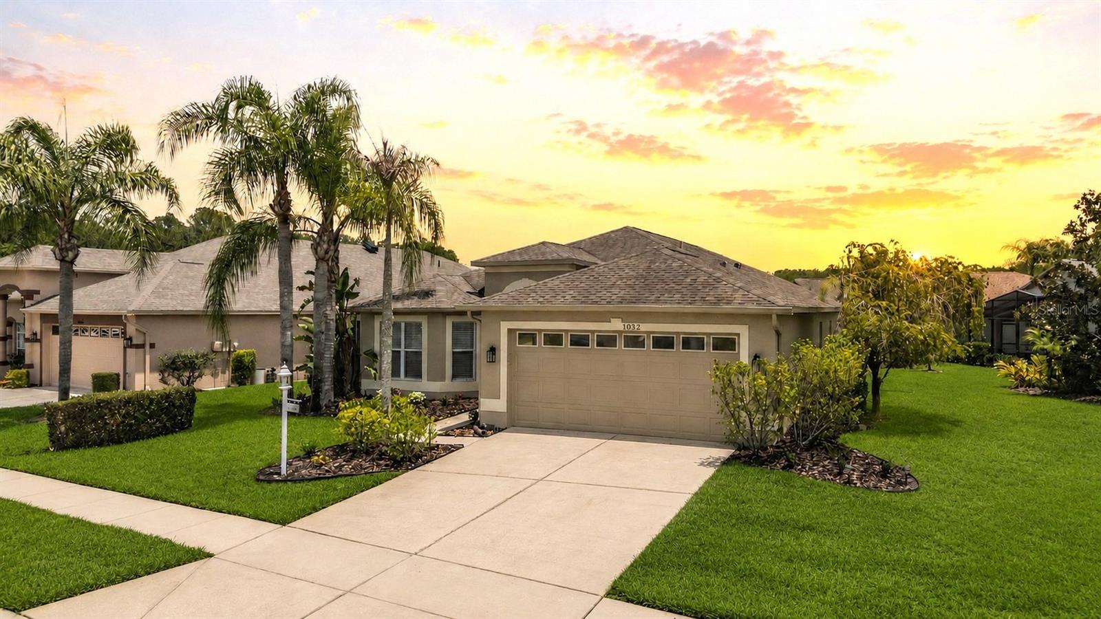 Nestled in the highly sought-after Heritage Springs community, this beautifully maintained home offers the perfect blend of comfort, style, and serene surroundings with greenspace beside the home and peaceful pond views. A/C & ROOF 2018. The Florida room gives you even more liveable space since it’s air conditioned - make this room your own! The inviting kitchen features stainless steel appliances, granite countertops, white cabinetry, and easy-care tile flooring, making it both functional and stylish. The open and airy great room is filled with natural light and showcases a neutral color palette, laminate flooring, and seamless views of the Florida room and tranquil pond beyond. The air-conditioned Florida room is the ideal spot to enjoy your morning coffee or unwind at the end of the day while taking in the relaxing water views. The spacious primary suite offers a large walk-in closet, an updated bath, and charming French doors leading directly to the Florida room. The third bedroom is generously sized and currently serves as a versatile flex space, perfect for a home office, hobby room, or guest retreat. The secondary bathroom has also been tastefully updated. Additional highlights include a walk-in laundry room with utility sink and extra storage options, plus an oversized 2-car garage with plenty of room for storage and convenience. 55 & FUN - LIVE THE HERITAGE SPRINGS LIFESTYLE - Resort style living at its absolute finest! Clubhouse with restaurant and bar, fitness, tennis, golf, cards, billiards, dancing and more! SUPERB TRINITY LOCATION, CLOSE TO BEACHES, DINING, SHOPPING, MEDICAL AND AIRPORT! Caution - Adults at Play!