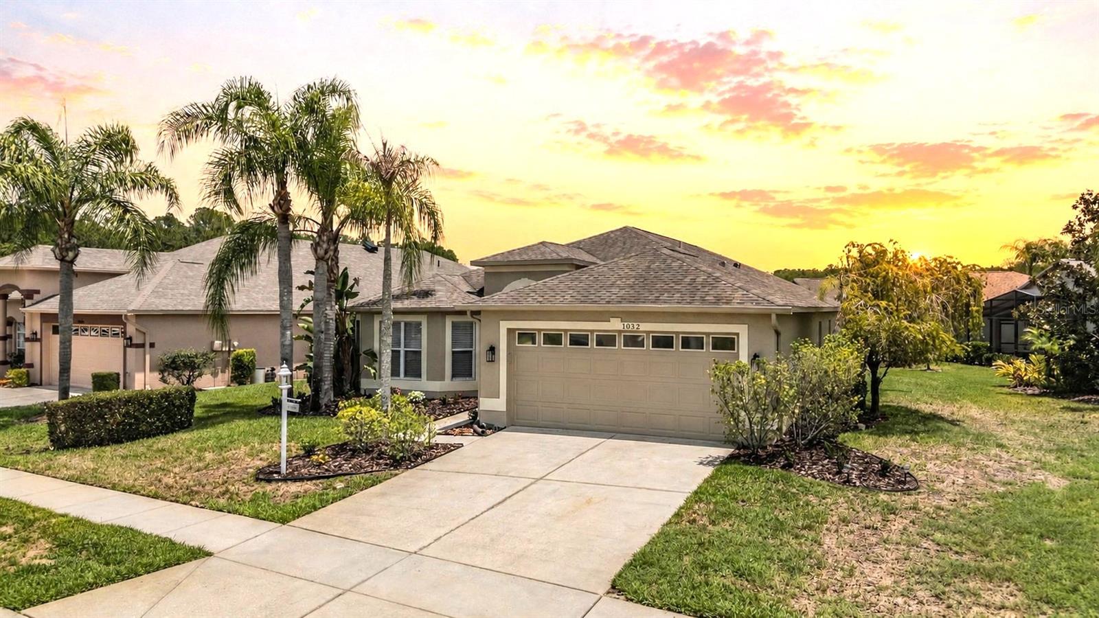 Nestled in the highly sought-after Heritage Springs community, this beautifully maintained home offers the perfect blend of comfort, style, and serene surroundings with greenspace beside the home and peaceful pond views providing 2000 sq ft of air conditioned space, including the Florida room. A/C & ROOF 2018. The Florida room gives you even more liveable space since it’s air conditioned - make this room your own! The inviting kitchen features stainless steel appliances, granite countertops, white cabinetry, and easy-care tile flooring, making it both functional and stylish. The open and airy great room is filled with natural light and showcases a neutral color palette, laminate flooring, and seamless views of the Florida room and tranquil pond beyond. The air-conditioned Florida room is the ideal spot to enjoy your morning coffee or unwind at the end of the day while taking in the relaxing water views. The spacious primary suite offers a large walk-in closet, an updated bath, and charming French doors leading directly to the Florida room. The third bedroom is generously sized and currently serves as a versatile flex space, perfect for a home office, hobby room, or guest retreat. The secondary bathroom has also been tastefully updated. Additional highlights include a walk-in laundry room with utility sink and extra storage options, plus an oversized 2-car garage with plenty of room for storage and convenience. 55 & FUN - LIVE THE HERITAGE SPRINGS LIFESTYLE - Resort style living at its absolute finest! Clubhouse with restaurant and bar, fitness, tennis, golf, cards, billiards, dancing and more! SUPERB TRINITY LOCATION, CLOSE TO BEACHES, DINING, SHOPPING, MEDICAL AND AIRPORT! Caution - Adults at Play!