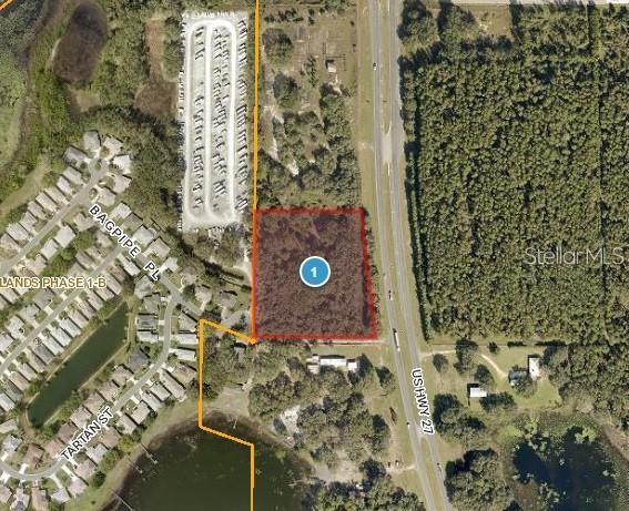 Incredible opportunity on 5 acres with approximately 390 feet of commercial frontage along US Highway 27. This is an excellent location with endless opportunity of on and off ramp access to US 27 and the Florida Turnpike. New commercial and residential development across RT27. Just 1,000 feet from Orlando Health South Lake Hospital. Adjacent to Royal Highlands and Monarch Golf Club - a community of 1,500 single family homes. Opportunities to explore are retail stores, office buildings, restaurants, hotels, gas stations, grocery stores, banks, shopping centers, and medical clinics.