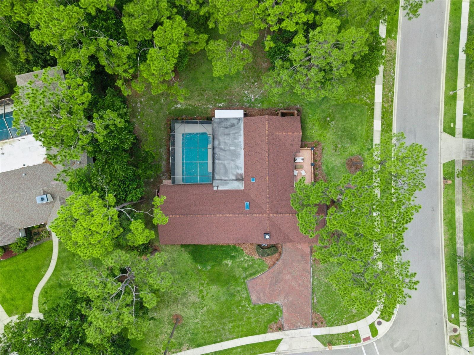 Welcome to 2271 Springs Landing Boulevard, a stunningly reimagined modern residence in the highly sought-after Springs Landing community of Longwood. This fully renovated 5-bedroom, 3-bathroom pool home spans 2,702 square feet, blending elevated contemporary design with timeless luxury finishes throughout.

From the moment you arrive, the home’s striking curb appeal makes a lasting impression with all-new paver driveways,  lush landscaping, and a completely updated sprinkler system. Inside, the home has been thoughtfully redesigned from top to bottom with porcelain tile flooring throughout, contemporary baseboards and doors, and recessed can lighting added throughout the home to create a bright, sophisticated atmosphere.

The heart of the home is the breathtaking kitchen, featuring custom shaker cabinetry, Taj Mahal granite and quartz countertops, designer tile backsplash, under-cabinet lighting, a wine refrigerator, and a massive walk-in custom pantry. The layout flows seamlessly into the living areas, centered around a custom stacked-stone fireplace with Taj Mahal granite hearth, creating the perfect blend of warmth and modern elegance.

This thoughtfully designed floorplan includes two luxurious primary suites, ideal for multigenerational living or hosting guests. The main primary retreat features a custom luxury walk-in closet, individual vanities, and a spa-inspired bathroom complete with a soaking tub and designer-level finishes. An additional bedroom offers flexibility as a home office, gym, or flex space. 

Indoor and outdoor living merge effortlessly through all-new sliding glass doors leading to the screened-in pool and outdoor entertaining spaces. The resurfaced pool, updated tile border, and expansive screened deck create a private backyard retreat perfect for entertaining year-round. Every space throughout inside and out has been beautifully renovated with elevated finishes, including a pool bath featuring a double vanity and custom storage shelving.

Major system updates provide complete peace of mind, including a new roof (2024), new windows, new water heater (2026), new HVAC system (2026), electrical panel updates (2025), and plumbing updates (2025).

Located in the desirable Springs Landing community off Markham Woods Road, residents enjoy proximity to Wekiwa Springs State Park, the Seminole Wekiva Trail, and top-rated Seminole County schools. If you're looking for that "Old Florida" feel while still being centrally located, then this is the home for you! Don't blink - this home is a rare opportunity to own a truly turnkey luxury home with resort-style amenities in the heart of Longwood.