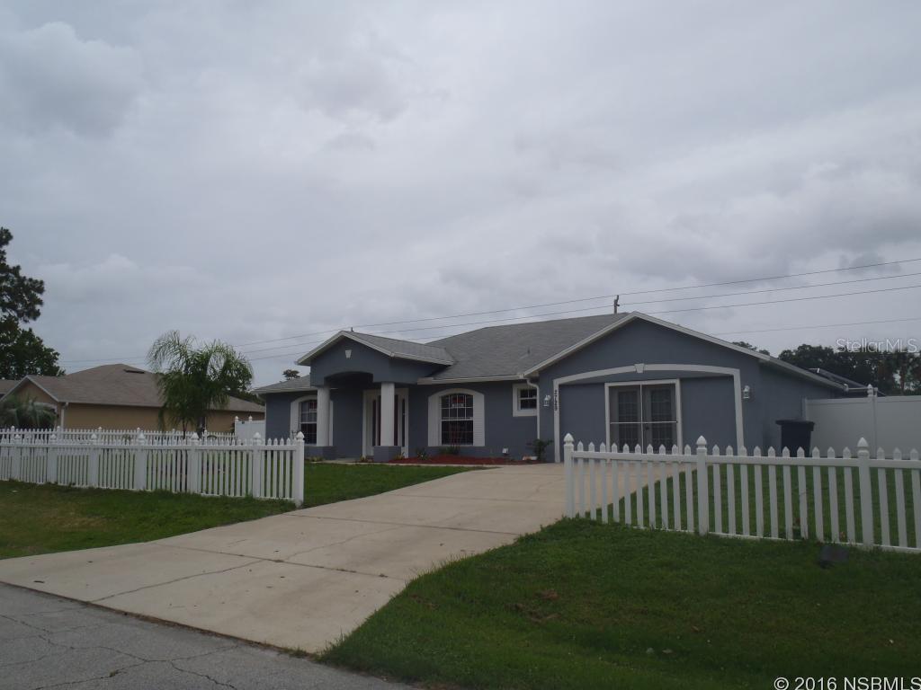Beautifully updated with bamboo wood flooring throughout, vaulted ceilings, fireplace, open kitchen with eat-in area, granite counters and stainless appliance.  Master features walk-in closet, tile walk in shower and separate garden tub.French doors leading to the Florida Room and screened pool.  Completely fenced yard with gates on both sides and white vinyl picket fence surrounding property.  4th bedroom could be convered back into garage but offers separate French Door entry.  Large laundry room separate from garage. ;Water: City