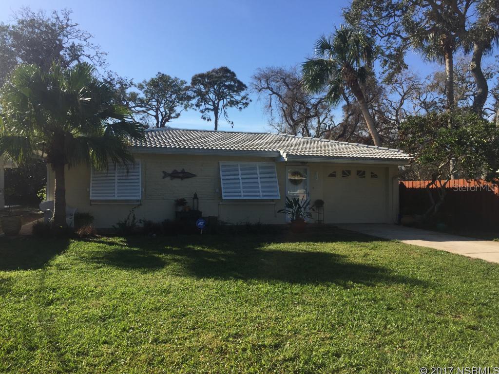 Perfect vacation home with oversized yard, plenty of room for pool!  Feet from the intercoastal and 4 blocks to ocean and Flagler Avenue.  Solid block home, living room, eat-in kitchen, 2 bedrooms, enclosed sunroom.  Outdoor shower with 1/2 bath and laundry.  Recent additions included on demand gas hotwater heater, pavers, fencing, stack washer/ dryer, 1 car garage converted to storage extra room but still has area for bikes etc. Tile roof power washed 2016, new sunroom windows 2016(hurricane rated) Bahama Shutters 2013 (hurricane rated).  All appliance stay including new Refrigerator, dishwasher and microwave.  This is a cream puff in one of the best locations beachside! ;Water: City
