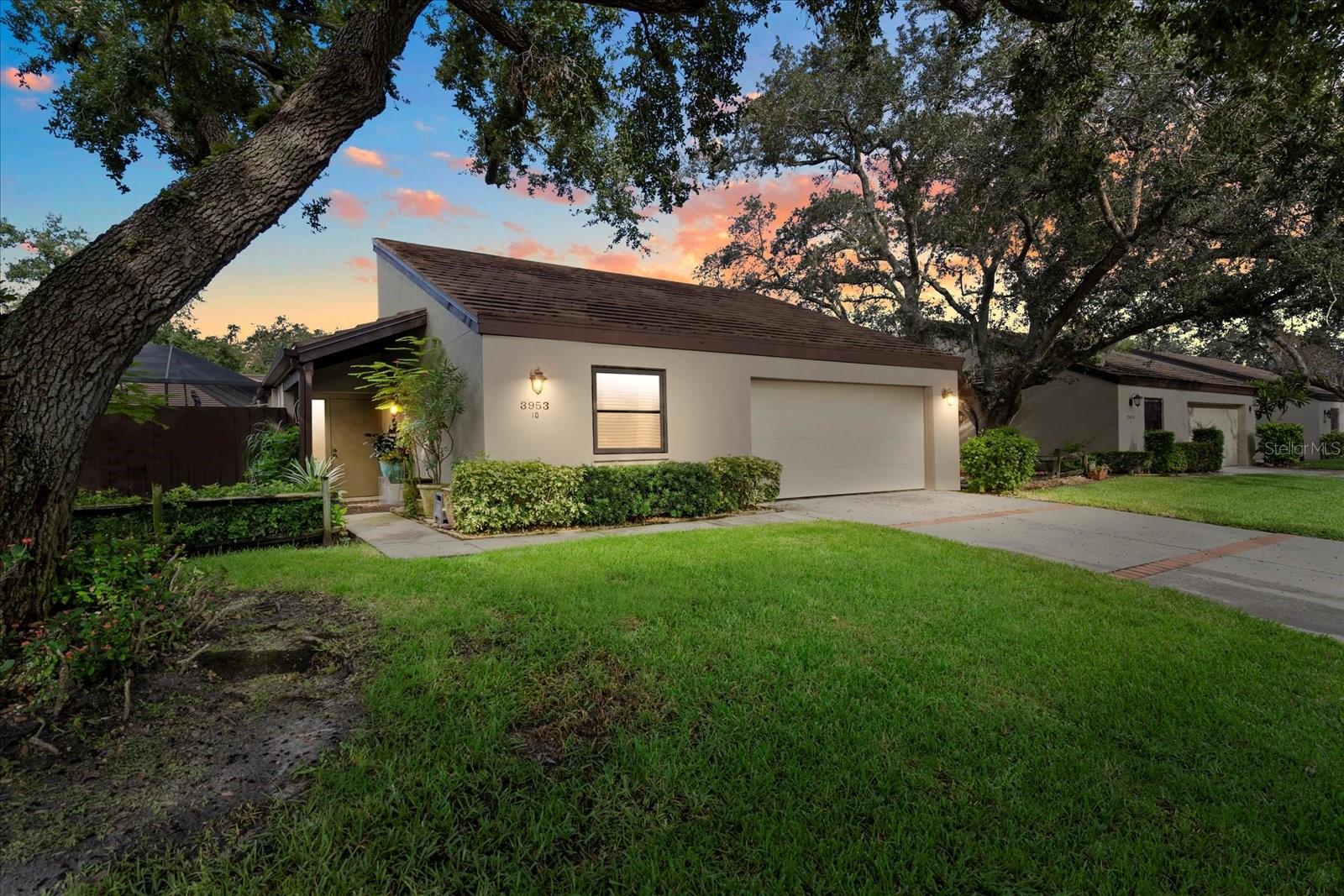 Welcome to 3953 Glen Oaks Manor Drive, a beautifully maintained residence offering a rare blend of privacy, thoughtful updates, and central Sarasota convenience in one of the city’s most established and tranquil communities.

Step inside to a light-filled layout centered around an enclosed atrium, creating a calming indoor-outdoor connection that’s perfect for relaxing, entertaining, or showcasing plants and décor. The home has been well cared for with major improvements already completed, including a new roof (2023), impact windows, A/C replaced in 2019, updated electrical panel, and replaced water supply lines, providing peace of mind for years to come.

An enclosed porch adds approximately 132 square feet under air, offering flexible space ideal for a home office, reading nook, or hobby room. The guest bedroom features a queen-size Murphy bed, allowing the room to function effortlessly as both a bedroom and a multi-purpose space.

Out back, the lushly landscaped lanai creates a private garden retreat—perfect for morning coffee, quiet evenings, or simply enjoying Florida’s indoor-outdoor lifestyle. Additional features include a whole-house water softener with reverse osmosis system in the kitchen, tree-lined streets, and a welcoming, walkable neighborhood ideal for biking and leisurely strolls.

Glen Oaks Manor is centrally located just minutes from the Bobby Jones Golf Club, shopping, dining, downtown Sarasota, and area beaches—offering a peaceful residential setting without sacrificing accessibility.

This is an excellent opportunity to enjoy a low-maintenance Florida lifestyle in a quiet, well-established Sarasota community.