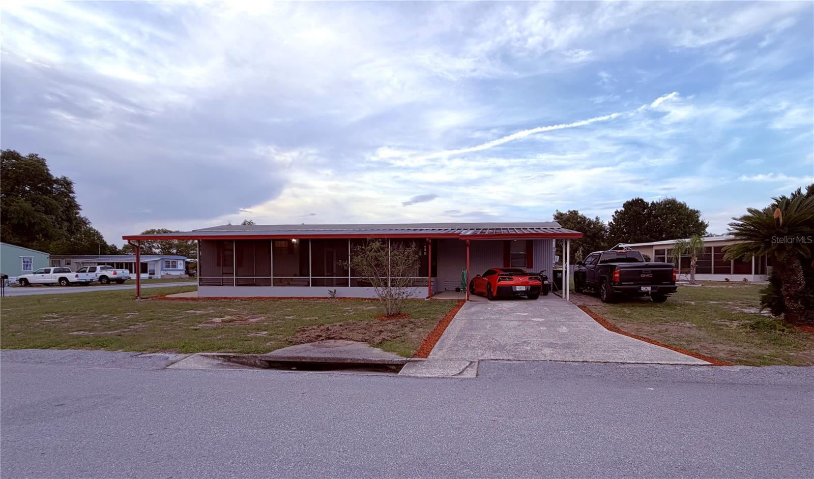 Step into this well maintained home that showcases durable luxury vinyl plank throughout the home with plumbing and electrical upgrades as well.  The home is situated on a corner lot in a quiet neighborhood where you will enjoy relaxing on the covered front porch and shaded parking under the carport, as well as Newer Minisplit air conditioning and more. Nice location between Tampa and Orlando and the growing hwy 27 corridor.  So Schedule your showing today!