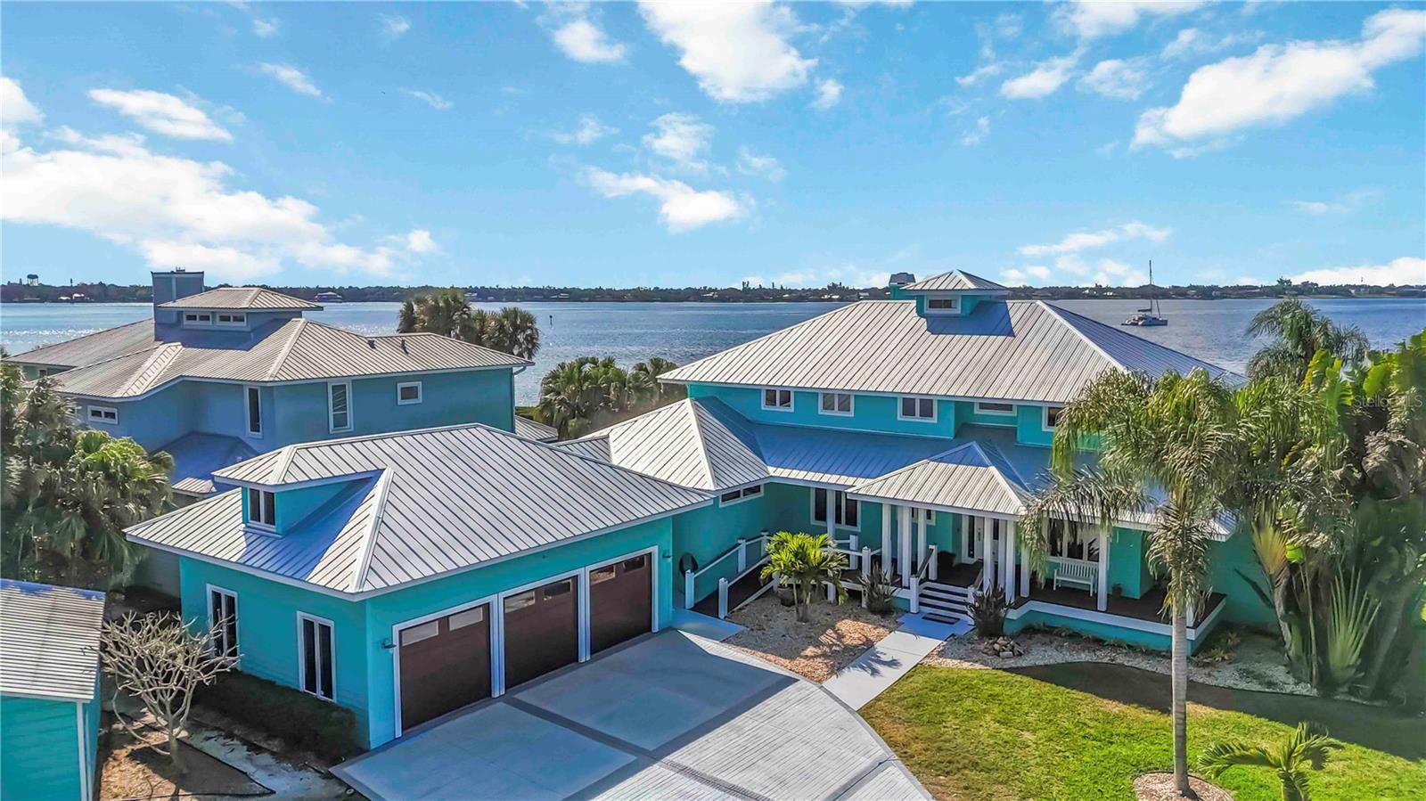 If you’ve been searching for a home that feels peaceful, solid, and thoughtfully designed, this one stands out. Located in one of Palmetto’s most sought-after neighborhoods, this home offers something you don’t find every day uninterrupted sunset views every single night. Whether you’re enjoying a quiet evening outside or hosting friends, the sunsets here become part of your daily routine.
Inside, the home feels warm and welcoming, with wood floors flowing throughout most of the house (tile in the laundry room and one additional room for durability). The layout is ideal for both everyday living and hosting. The primary suite is on the main level, complete with a private office, creating a calm, comfortable retreat. There’s also a downstairs ensuite, perfect for guests or extended family.
Upstairs, each bedroom has its own private bathroom, offering comfort and privacy for everyone, along with an additional office or flex space that works beautifully as a second living area, workspace, or media room.
The kitchen truly brings everyone together, featuring quartz countertops, stainless steel appliances, a gas stove, a walk-in pantry, and a gas dryer hookup. Step outside to the outdoor kitchen, ready for summer barbecues, weekend gatherings, and evenings spent watching the sky light up as the sun sets.
Built with quality and longevity in mind, the home sits on a concrete stem wall foundation with a TJI floor system. It also offers exceptional peace of mind with a 38kW whole-home Generac generator, installed in 2023, backed by a 7-year transferable extended warranty through June 2030, capable of powering the entire home. A 500-gallon owned propane tank and two gas tankless water heaters add to the home’s efficiency and reliability.
This is the kind of home where life feels a little easier private spaces for everyone, room to gather, and sunsets you’ll never take for granted!