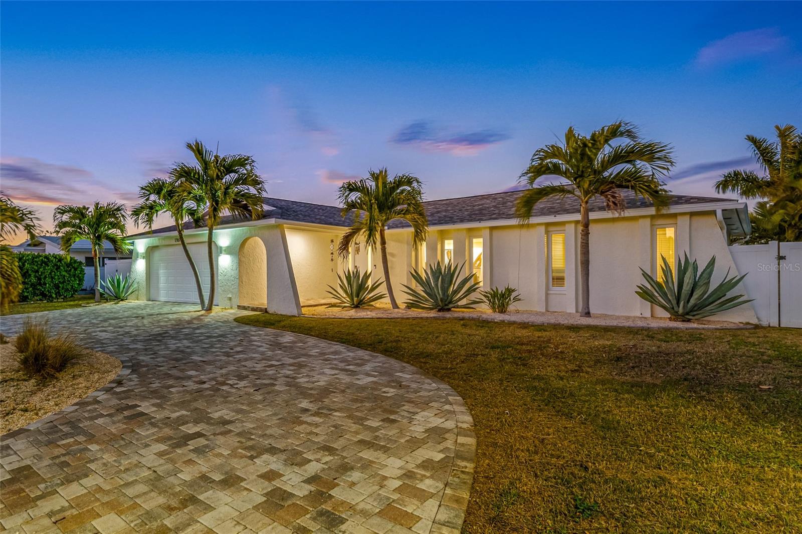 LOCATION-LOCATION-LOCATION
Experience the pinnacle of upscale waterfront living in this exquisitely remodeled pool home, perched on deep sailboat water with a sweeping canal panorama that unfolds beyond, instantly elevating every moment you spend here. Every detail has been meticulously refreshed to blend contemporary luxury with coastal elegance, delivering a turnkey sanctuary ready for its new owner from the moment you step inside. The open, sun-filled interiors showcase expansive water views from multiple rooms, with an elegant flow that invites effortless entertaining and everyday living. The chef’s kitchen gleams with high-end appliances, granite countertops, custom cabinetry, and a generous island that mirrors the sophistication of the home, while the living and dining areas open gracefully to capture the canal backdrop. This residence offers three tranquil bedrooms and two spa-inspired baths, including a tranquil primary suite with lush closet space and a luxe ensuite, all thoughtfully arranged to maximize water views and privacy. A dedicated two-car garage complements the layout, while a resort-style pool area and al fresco entertaining spaces provide a refined outdoor oasis perfect for sun-soaked days and sunset soirees. Direct canal access supports boating, kayaking, or paddle boarding just steps from your door. This home stands out not only for its unobstructed canal outlook and pool-side luxury but also for its immediate move-in readiness—no projects left to tackle and no compromises on quality or style. If you’ve been dreaming of a premier waterfront lifestyle that combines depth of water, expansive vistas, a pristine saltwater pool, and a fully remodeled, turn-key interior, this is the opportunity you’ve been waiting for.Roof 2024, remodel 2025. Easy stroll across Gulf Blvd to the pristine sugary white sands of Redington Beach. Numerous restaurants and shopping close by. Schedule a private tour and experience the depth of the water, the breadth of the views, and the glow of a meticulously renovated masterpiece.