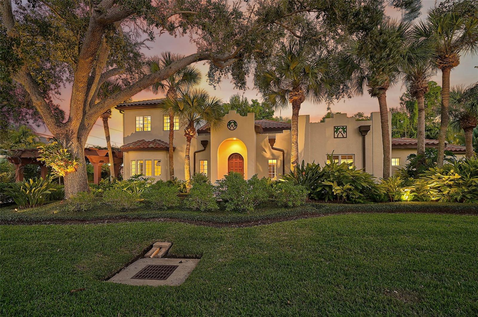 Under contract-accepting backup offers. **BRILLIANTLY UPDATED and METICULOUSLY MAINTAINED ESTATE in OYSTER BAY, a Coveted, West of Trail Neighborhood**  Situated on a large CORNER LOT, this 4-BED, 3 FULL and 1 HALF BATH residence is being Sold FURNISHED and offers desired privacy and extensive updates.  Attention to detail is evident throughout this warm contemporary home featuring an open floorplan and unobstructed views of the Courtyard, Pool & Spa and Garden.  For the culinary enthusiast, the impressive Kitchen boasts premium brand appliances including Subzero, Miele and Wolf.  Enjoy the warmth of the wood-burning fireplace in the adjacent family room.  Flexible Owner’s Suite with either Second or First-Floor possibilities.  The second-story primary suite features a balcony overlooking the courtyard and pool, Multiple Walk-In Closets, beautifully update primary bath with dual vanities, custom-tiled shower, soaking tub, etc.  In addition to the two guest bedrooms on the first floor, an additional room can also function as a spacious primary bedroom suite with an adjacent, updated Full Bath.  NEW HVAC, WASHER & DRYER; WHOLE HOME GENERATOR (2021); NEWER ROOF (2017); HURRICANE IMPACT WINDOWS/DOORS (2018), ETC. Excellent location with easy access to lifestyle amenities — just a half mile to The Field Club… and in close proximity to Southside Village, Sarasota Memorial Hospital, Shopping Centers and Area Beaches including #1 Rated Siesta Key Beach.  **Please Enjoy Viewing the 3D Virtual Tour and Aerial Video**