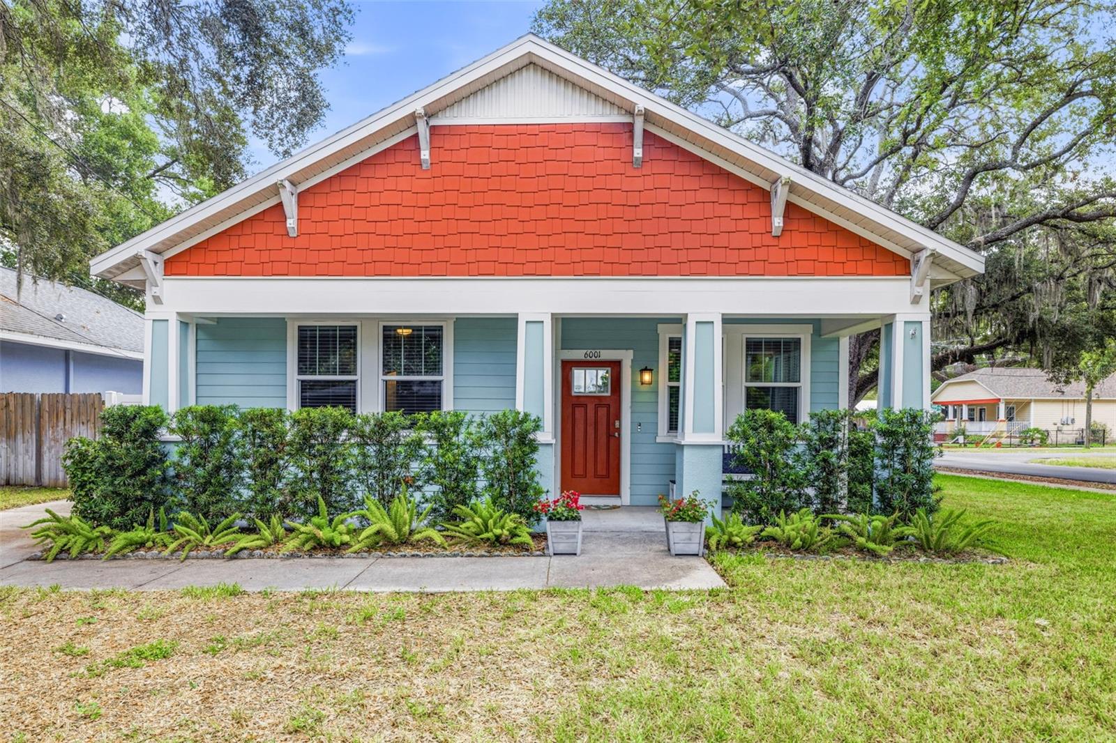 Virtually Staged. Welcome to Seminole Heights, one of Tampa's most beloved neighborhoods, where historic charm, tree-lined streets, and a vibrant local culture come together to create one of the city's most desirable places to call home. Residents are surrounded by an incredible selection of locally owned restaurants, craft breweries, coffee shops, and year-round community events that give Seminole Heights its unmistakable personality. Built in 2017, this beautifully designed bungalow-style home captures the charm of a historic Seminole Heights residence while delivering the comfort, efficiency, and peace of mind of newer construction. Situated on a desirable corner lot in Flood Zone X (no flood insurance required), this 3-bedroom, 2-bathroom home features over 1,500 square feet of thoughtfully designed living space with a split floor plan, abundant storage, and exceptional versatility. The covered front porch enhances the home's curb appeal, offering plenty of room for a porch swing or comfortable seating area. Inside, you'll immediately appreciate the open-concept floor plan, enhanced by luxury vinyl plank flooring, crown molding, recessed lighting, and custom window trim. The chef-inspired kitchen showcases shaker-style cabinetry, granite countertops complemented by a classic subway tile backsplash, stainless steel appliances, including a stylish vent hood, and a pantry cabinet with microwave. A large center island with designer pendant lighting and space for counter-height seating creates the perfect gathering space for family and friends. The spacious primary suite provides a relaxing retreat complete with a custom feature wall, recessed lighting, a walk-in closet, and a beautifully appointed ensuite bathroom. The bathroom features dual sinks set in a granite countertop with shaker-style cabinetry, a wood-framed mirror, and a glass-enclosed shower with custom tile and stone-style flooring. Two additional bedrooms offer exceptional flexibility to suit your lifestyle. One includes a Murphy bed and built-in desk system that convey with the home, making it ideal as both a guest room and a work space, while the other features cube wall shelving that also conveys. The secondary bathroom offers a tub/shower combination with classic subway tile, tile flooring, and a pedestal sink. French doors open to a covered back patio with a ceiling fan overlooking the private fully-fenced backyard complete with two separate gate entrances and a shed for added storage. Additional upgrades include a new 2024 HVAC system, a 2026 dishwasher, an integrated pest control system, an irrigation system, a pre-wired security system, a digital thermostat, and an in-home laundry closet with washer and dryer hookups. Just minutes from Downtown Tampa, Armature Works, the Tampa Riverwalk, Ybor City, the Heights District, and the Hillsborough River, you'll enjoy endless opportunities for dining, entertainment, outdoor recreation, and waterfront activities. Commuters will appreciate quick access to I-275, I-4, and I-75, while Tampa International Airport, Raymond James Stadium, Busch Gardens, the University of South Florida, and Seminole Hard Rock Hotel & Casino are all just a short drive away. Blending historic character with modern convenience, this is truly one of Tampa Bay's most sought-after locations. Schedule your private showing today!