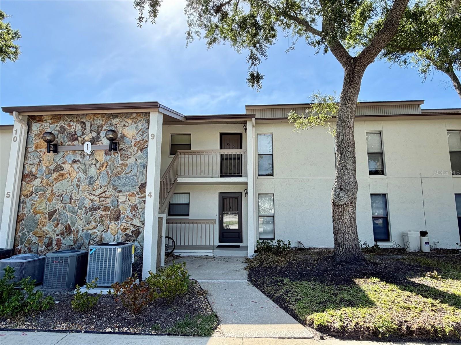 Welcome to this beautifully updated 2-bedroom, 2-bath first-floor condo in an unbeatable location! Step inside to find a bright, open living space. The kitchen features white wood cabinetry and stainless-steel appliances. Both bedrooms are spacious with the primary suite including a walk-in closet and a private en-suite bathroom, creating the perfect retreat. A separate laundry room and private outdoor storage closet with key access add extra convenience and functionality. Enjoy a peaceful pond view from the backyard patio, this quiet and well-maintained community provides the perfect blend of comfort and convenience. Just steps from the community pool and spa. You will love the ability to walk to John Chestnut Sr. Park and enjoy easy access to the Pinellas Trail, local beaches, the YMCA, shopping, dining, hospitals and A+ rated schools. Commuters will appreciate the convenient access to Tampa International Airport. Rent includes water, sewer, trash, exterior maintenance, and grounds maintenance. Don’t miss this opportunity to enjoy a beautifully updated condo in one of Palm Harbor’s most desirable locations!