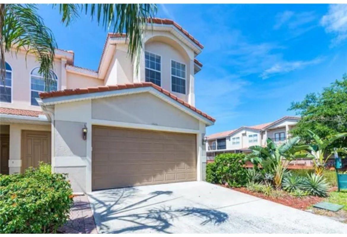 Welcome to your dream home in the sought-after community of San Marino Bay! This spacious 3-bedroom, 2-bathroom townhome is an absolute gem, boasting the largest floor plan in the neighborhood. As you step inside, you'll be greeted by the grandeur of 10-foot ceilings and the warmth of bamboo flooring that flows seamlessly throughout. Your oversized master suite, complete with its very own balcony, is your personal oasis where you can savor your morning coffee or unwind with a glass of wine while taking in the serene views. The stunning kitchen showcases beautiful granite countertops, pristine wood cabinets, and gleaming stainless steel appliances. Whether you're whipping up a gourmet meal or simply enjoying a quick snack, the kitchen overlooks the dining room, offering not only culinary convenience but also a captivating water and fountain view. But the allure of this property extends beyond its walls. San Marino Bay is a highly desirable community with a plethora of amenities, including tennis courts, a playground, and direct water access to both Tampa Bay and the Gulf of Mexico. When you're ready to venture out, you're just a stone's throw away from shopping, dining, and entertainment options. Tampa International Airport is conveniently close, and you'll find it's an easy commute to the top-rated Gulf Beaches. This townhome is more than a house; it's a lifestyle. Don't miss your chance to make it yours – schedule your showing today!