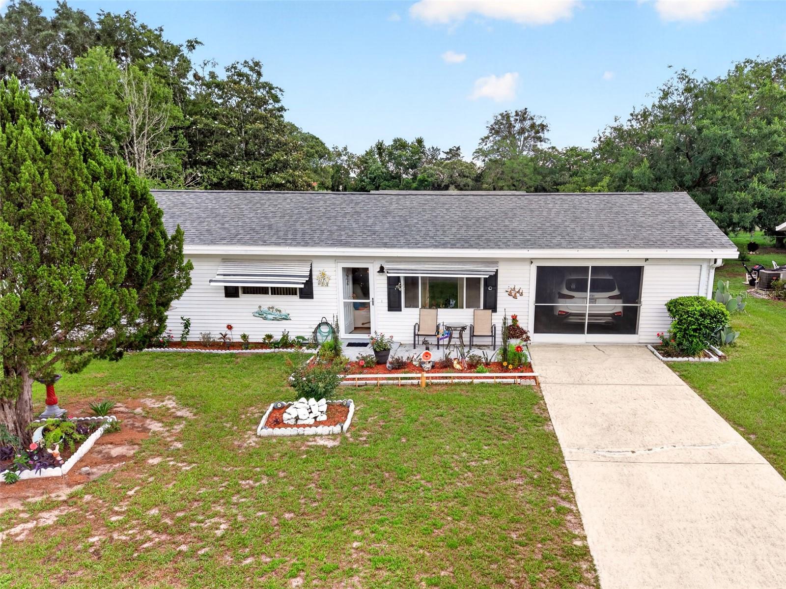 MOVE IN READY HOME This beautifully maintained home offers peace of mind with a new roof installed in 2025, a 2023 HVAC system, and updated flooring throughout. The interior features a bright and inviting layout designed for comfortable Florida living, with spacious living areas perfect for everyday enjoyment and entertaining guests. Palm Cay is one of Ocala's most established active-adult communities, offering residents a vibrant lifestyle with gated security, The clubhouse, swimming pool and spa, fitness facilities, tennis and pickleball courts, shuffleboard, walking trails, RV storage, and a full calendar of social activities and clubs. The community is conveniently located just minutes from shopping, dining, medical facilities, and the Highway 200 corridor