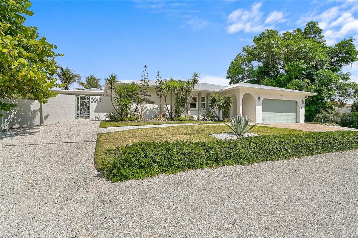 Positioned on the highly desirable north end of Siesta Key within the city limits, 3515 La Paloma Ave is a fully reimagined coastal retreat blending luxury living with exceptional flexibility and income potential. Just moments from Siesta Key Village, the beach, and the North Bridge, this elevated property offers the ideal balance of privacy, accessibility, and island lifestyle.



This rare 5-bedroom coastal property offers nearly 3,000 total square feet of thoughtfully designed living space, beautifully renovated with designer finishes, open-concept living, and a bright modern coastal aesthetic throughout. The resort-style backyard showcases a screened pool, tropical landscaping, multiple entertaining areas, and seamless indoor-outdoor living.



A detached mother-in-law suite with private entrance includes an additional bedroom, full bathroom, walk-in closet, and dry bar, creating exceptional flexibility for guests, multigenerational living, or income-producing opportunities.



Offered turnkey furnished and move-in ready, this is a unique opportunity to own a high-producing coastal retreat in one of Siesta Key’s most sought-after locations.