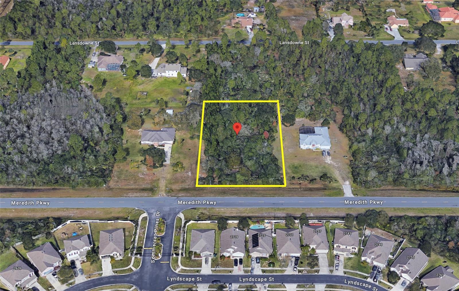 Located in the desirable Wedgefield community of Orlando, this oversized vacant homesite on Meredith Parkway offers a rare opportunity to build a custom estate in one of East Orange County’s fastest-growing residential corridors. Situated within the Cape Orlando Estates area, the property features approximately 1+ acres of buildable land with paved road access, surrounded by custom homes, mature trees, and a peaceful country-style setting while remaining conveniently close to modern amenities.  

Zoned A-2, the parcel provides flexibility for a spacious single-family residence with room for a detached garage, workshop, RV or boat storage, outdoor entertaining space, or additional recreational amenities. The neighborhood is known for its large lots, privacy, and equestrian-friendly atmosphere. Utilities in the area typically include electricity availability, with well and septic systems commonly required for new construction.  

The location offers excellent accessibility to SR-528, SR-520, Orlando International Airport, downtown Orlando, the Space Coast beaches, and major employment hubs while maintaining the tranquility of rural living. Nearby parks, preserves, golf, and outdoor recreation further enhance the appeal of this homesite for buyers seeking both space and convenience. Buyer must do their own due diligence. The seller does not have any surveys, wetland, or environmental reports.