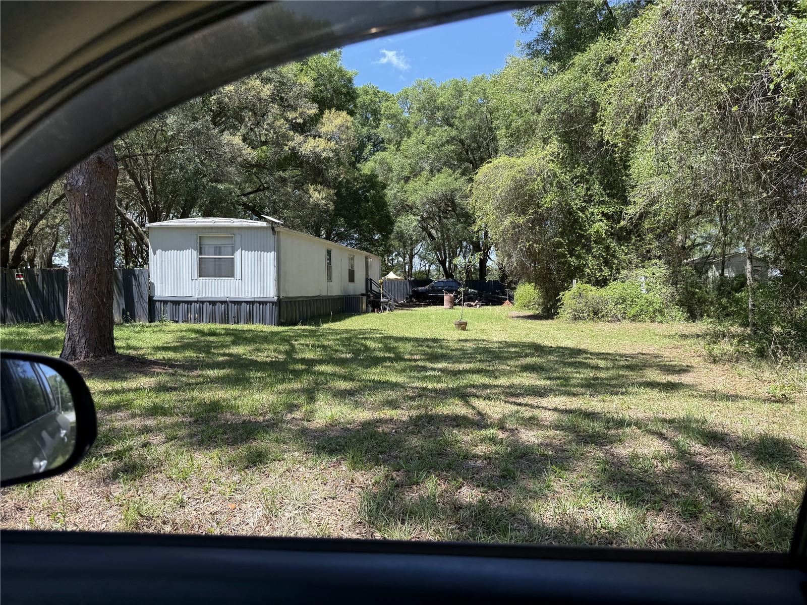 Investor Wanted! Two Rentals on One Property! These Mobile Homes Stay Rented and the Cap Rate is Super! The property could use some TLC, Good Bones with some cosmetics needed. Each mobile is 2 bed/1 bath and both have large outbuildings. This 1.25 acre parcel is zoned General Agriculture. This property is minutes to Ocala Shopping, Restaurants, and Healthcare Facilities. I-75 is only a short commute. Investors run to this property!