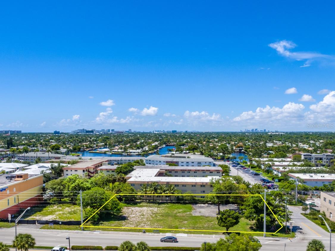 Great corner location near Pompano City Center and the New Innovative District, this commercial site has 200+ of linear frontage. The lot is just over 1/2 Acre and less than 1/2 block from KOI Residences which consist of 46 three & four-story villas, 26-slip marina, 10 story buildings with 204 residential units and 15,000 SF of Commercial retail fronting on Atlantic Blvd. The ideal use for this site would be a mixed used project retail/commercial project or executive office building to take advantage of the KOI residential demand. The lot has high visibility and SE 6th Ave provides excellent ingress & egress off Atlantic Blvd.