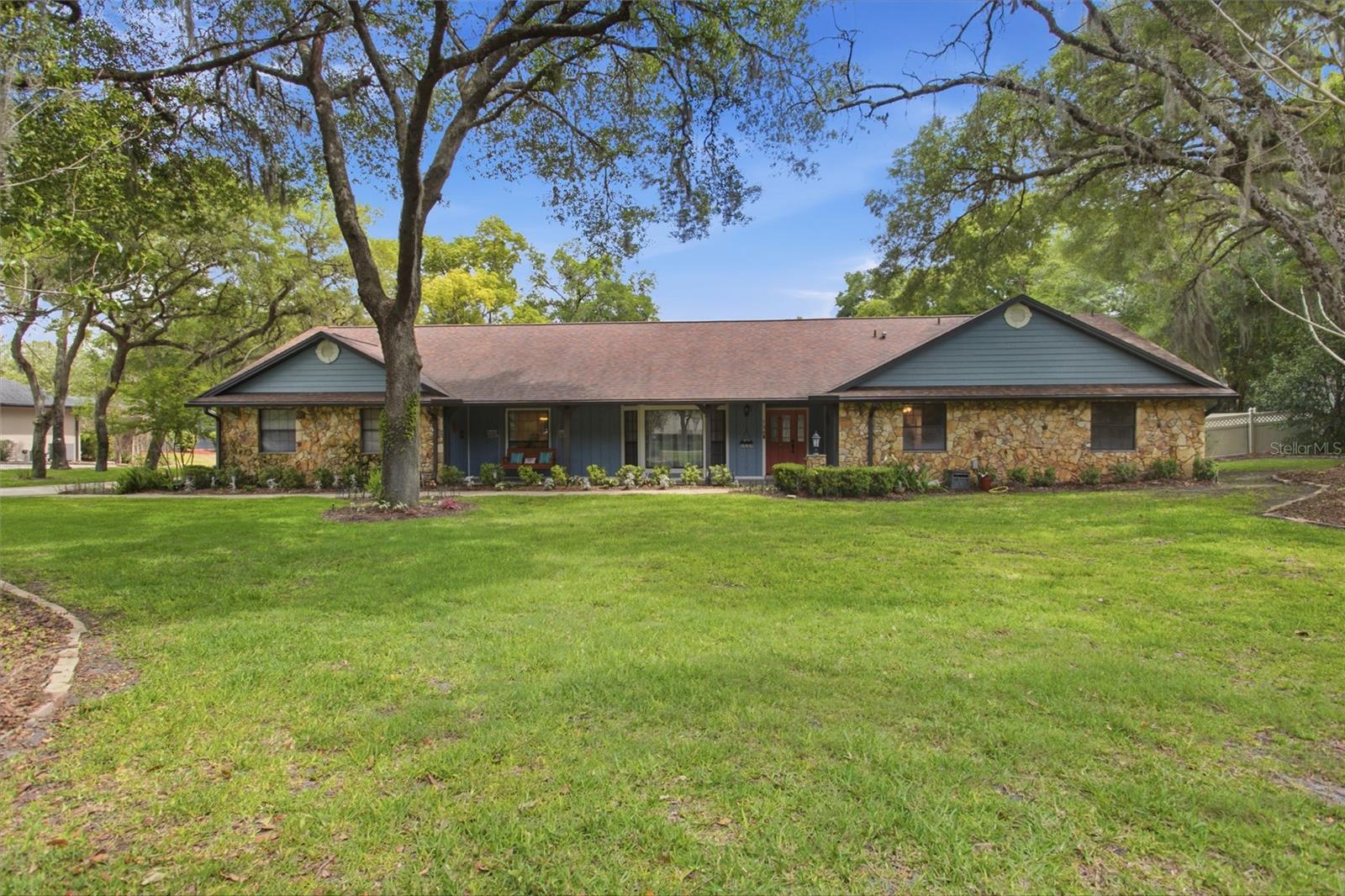 Welcome to your private slice of paradise in the heart of Lake Mary off of Markham Wood Road.  1 Acre Lot, POOL HOME, This spacious 4-bedroom, 3-bath, 3 car garage home with a dedicated office with separate entrance offers over 3,100 square feet of flexible living space, perfectly designed for comfort, functionality, and future personalization.
Set on just over an acre, this property is truly a gardener’s dream—featuring mature landscaping, vibrant flowers throughout, drip irrigation, and a separate well dedicated to keeping everything lush year-round. The outdoor space is a standout, with a screened-in pool and spa, an expansive covered porch, and a convenient pass-through window to the kitchen—perfect for entertaining or relaxing Florida-style.
Inside, you’ll find a thoughtful layout with both formal and casual living spaces, including a formal living room, family room, formal dining room, and a kitchen dinette. 
All bedrooms are generously sized and feature direct bathroom access, creating ideal flexibility for multi-generational living or multiple primary suite options. Three large sliding glass doors provide seamless indoor-outdoor living from the kitchen, family room, and primary bedroom. Check out the Spinning shoe carousel in master closet
Additional highlights include a 3-car garage and an unbeatable location just off Markham Woods Road—offering a peaceful, country-like setting while still being minutes from top-rated dining, shopping, and everyday conveniences.
UPGRADES: Giving buyers peace of mind while leaving room to make the interior their own.
New HVAC (2022), 
Roof (2020)
Hybrid water heater (2023)
Septic drainfield (2022)
Variable speed pool pump
Exterior painted
Knockdown ceiling in family room, game room, dining room, master bedroom, office, Porcelain plank wood look tile (family room, dining room, master bedroom, office)
Custom baseboard (dining room, master bedroom, office)
Mantel Mount MM540 tv mount living room, tv mounts in all bedrooms, office
Ethernet wiring all bedrooms & office
Ceiling fans all bedrooms & office
Dale Tiffany lighting in dining room, game room
Well for irrigation, 6-zone sprinkler system, drip irrigation system in rear plant beds Updated recessed lighting in master, office, game room and dining room.
Updated oil rubbed bronze door hardware.
Stainless steel appliances
Custom garage shelving
Custom wood closet systems in both master WIC 
New garage door openers (bearings, cables, shaft) with battery backup & video camera
New tile front porch, new solid cedar posts, front and back, custom thick post hardware
New blown in insulation in attic 2022