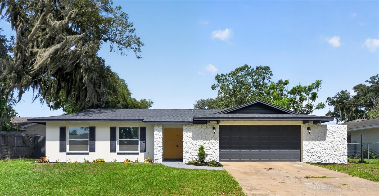 Virtually Staged. Welcome home to this beautifully updated pool home tucked away on a quiet cul-de-sac in established Orlando neighborhood. NO HOA.  Offering the perfect combination of modern updates and outdoor living, this move-in ready home features a 2020 roof, brand-new A/C (2026), 2021 water heater, updated windows and French doors, fresh interior and exterior paint, and a new pool pump and motor for added peace of mind. The spacious kitchen has been tastefully updated with shaker-style cabinetry, granite countertops, new stainless steel appliances, and modern hardware and fixtures. The functional floor plan provides comfortable living spaces with abundant natural light, making it ideal for both everyday living and entertaining. Step outside to your own private backyard retreat featuring a large screened-in porch overlooking the sparkling pool—perfect for enjoying Florida's year-round sunshine, hosting family gatherings, or simply relaxing at the end of the day. Additional features include a spacious two-car garage offering excellent storage, updated finishes throughout, and numerous mechanical improvements that make this home truly move-in ready. Conveniently located with easy access to major highways, shopping, dining, schools, and area attractions, this home offers the perfect blend of comfort, style, and convenience. Don't miss your opportunity to make this beautifully updated pool home your own!