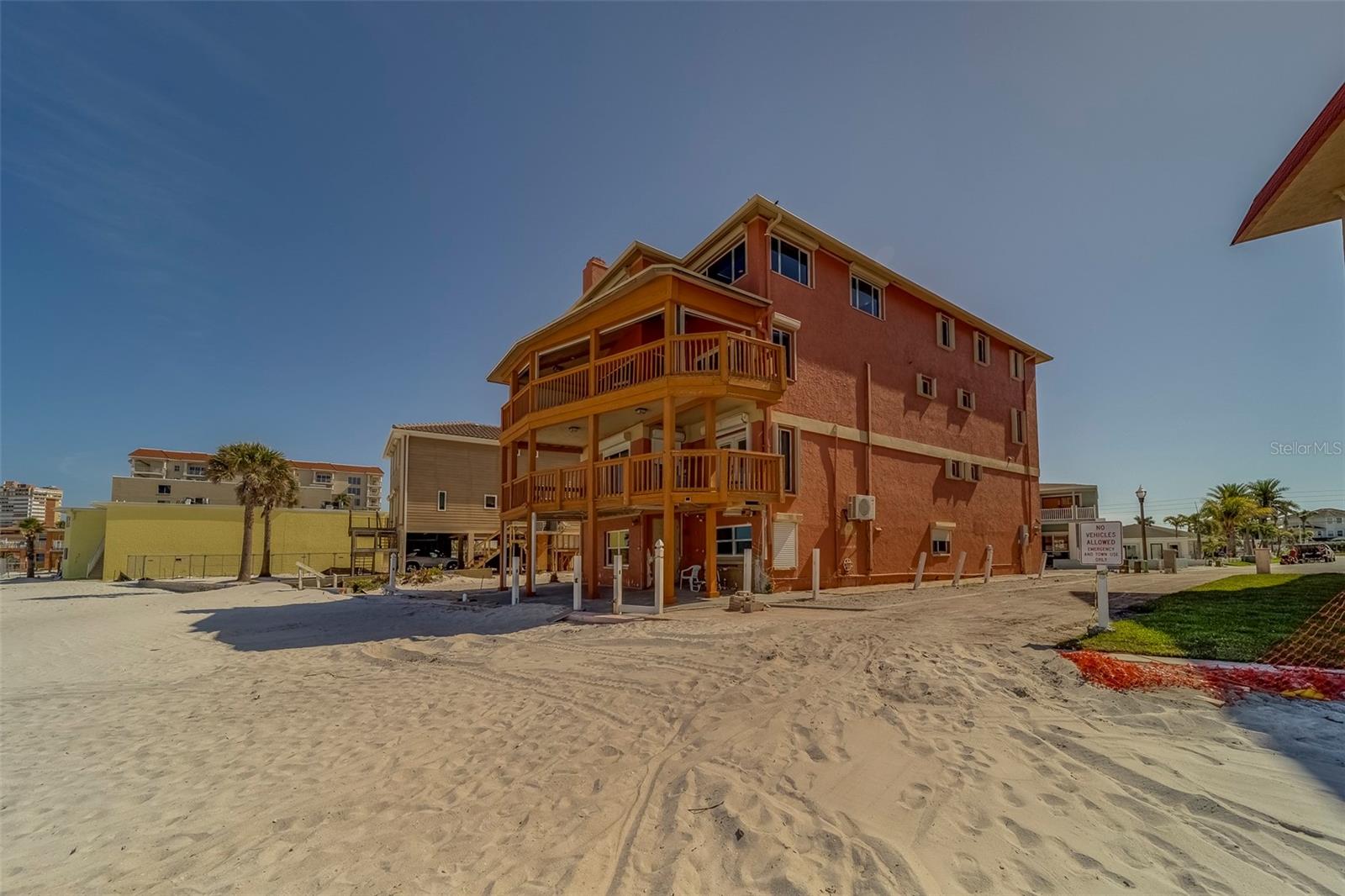 Under contract-accepting backup offers. An exceptional opportunity awaits with this expansive four-story residence, uniquely designed for multi-generational families or savvy investors, located directly on the pristine sands of Redington Shores. Built in the 1990s, this substantial eight-bedroom, seven-bathroom home offers a rare and versatile living experience, with each of its four levels thoughtfully designed as a private, self-contained living space.
Imagine waking to the sound of gentle Gulf waves and stepping out onto your balcony to greet the Florida sunshine. This distinct property ensures both togetherness as every floor features its own bedrooms, bathrooms, kitchen, and comfortable living area. This innovative layout provides unparalleled flexibility, making it an ideal retreat for large families desiring individual privacy while sharing a magnificent beachfront location. This is zoned Multi Family, so the sky is the limit. The home’s prime position on the shores of Redington Beach means direct access to the soft, white sand and the sparkling waters of the Gulf of Mexico. Enjoy breathtaking sunsets, leisurely strolls along the coastline, and all the recreational activities that beachfront living affords. Beyond its appeal as a spacious family compound, this property presents a remarkable income-producing potential. The individual living spaces lend themselves perfectly to a vacation rental model, allowing for multiple rental units within a single, prestigious address, catering to groups of various sizes seeking a memorable beach getaway.
This is more than just a house; it's a versatile coastal haven offering a unique lifestyle or investment in one of Florida's most desirable beach communities. Don't miss the chance to own this remarkable Redington Shores property, where every level tells its own story of seaside serenity and comfort.