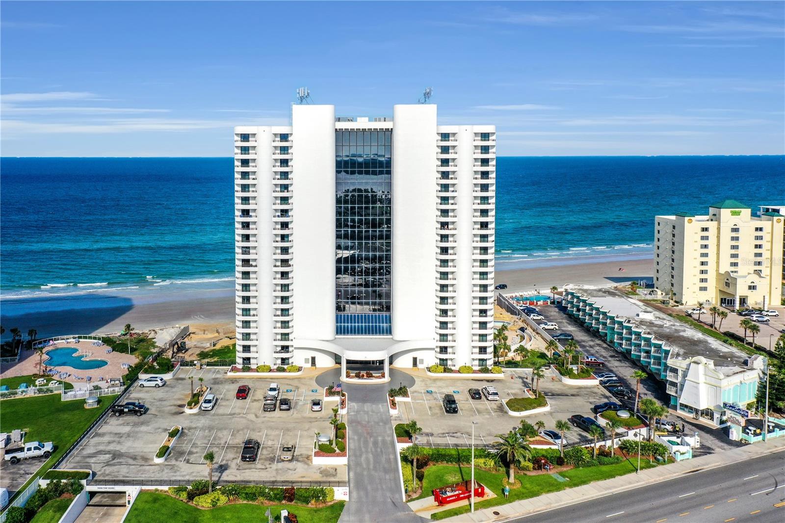 MILLION DOLLAR VIEWS! CHERISH THIS DIRECT OCEANFRONT CORNER UNIT WITH MULTIPLE BALCONIES THAT PROVIDE POST-CARD WORTHY VIEWS OF THE OCEAN AND RIVER! 

LET THE SHERWIN'S TROPICAL SETTING TRANSPORT YOU TO PARADISE! THE FREE-FORM FOUNTAIN IS AN ARCHITECTURAL MASTERPIECE WITH A BRILLIANTLY DESIGNED ATRIUM. SPRAWLING 1,561 SQUARE FEET WITH 2 BEDROOMS, 2 BATH, THIS IS A RARE GEM AND DELIVERED COMPLETELY FURNISHED* THE OCEANFRONT LIVING ROOM, WITH AN AMAZING OPEN FLOOR PLAN, IS THE CROWNING JEWEL OF THIS OFFERING AND BOASTS NEW WINDOWS AND SLIDERS. WITH A GREAT VANTAGE POINT ON THE 11TH FLOOR, THE SWEEPING OCEAN VIEWS WILL TRANSPORT YOU TO PARADISE! ADDITIONALLY, THE LIVING ROOM, KITCHEN, AND BOTH BEDROOMS ALL HAVE BALCONY ACCESS. THE BEACH INSPIRED KITCHEN OPENS TO THE BALCONY AND EMBODIES A LIGHT, BRIGHT AMBIENCE. 

LARGE PRIMARY SUITE WITH SPACIOUS WALK-IN CLOSET AND BALCONY ACCESS PLUS A LUSH GUEST BEDROOM WITH A PRIVATE BALCONY THAT SHOWCASES WEST AND EAST VIEWS WITH BREATHTAKING BEACHFRONT SPLENDOR. 

OTHER NOTABLE FEATURES INCLUDE: LG REFRIGERATOR, BOSCH DISHWASHER NEW WINDOWS AND SLIDERS, NEW BALCONIES.
SHERWIN HAS TOP-NOTCH AMENITIES INCLUDING A PENTHOUSE CLUBROOM WITH FULL KITCHEN AND CAPTIVATING VIEWS, CLUB LEVEL FITNESS CENTER, SAUNA, HOT TUB, AND GAME ROOM. SECURE UNDERGROUND PARKING AND PET FRIENDLY! All information intended to be accurate but should be verified. Please call management with any additional questions about the building.