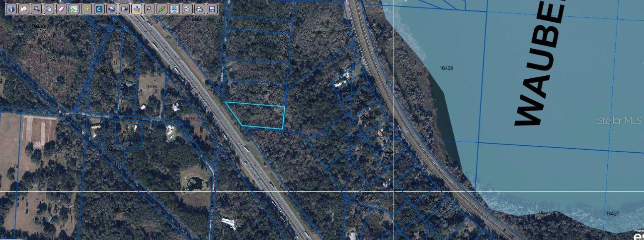 Great opportunity to acquire a 2.19-acre vacant lot on SE Wacahoota Rd, Micanopy, FL 32667. "Zoning: A" This expansive parcel offers a peaceful, rural setting ideal for building a custom spot, creating a private retreat, or pursuing future development. With abundant space and natural surroundings, the property provides exceptional flexibility for design, landscaping, and outdoor living. Perfect for builders, investors, or buyers.Pin Location: Latitude 29.52663533, Longitude -82.31181480. Note: buyers I emphasize the importance of conducting thorough due diligence to ensure that the property meets your expectations and requirements.