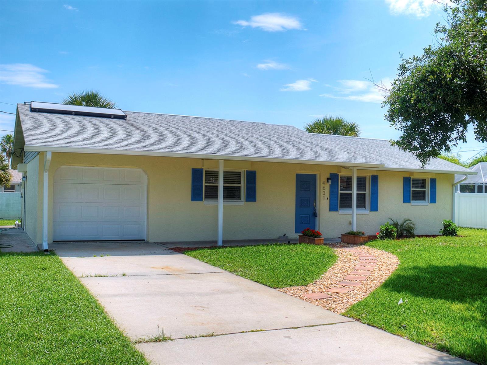 Beachside Alert!! Amazingly Remodeled 3 bedroom 2 bathroom 1 car garage within walking distance to the beach.
Oversized Screened Florida Room with New Outdoor Carpet! All New Stainless steel kitchen Appliances, Granite countertops Large tile throughout the complete living area. Updated bathroom including a walk in master bedroom shower. His & Hers closets in the master bedroom. All NEW- A/C, Electrical Panel, Sprinkler/Well Pump, and just completed the exterior Paint.  Roll Down Storm Shutters & a Solar Water heater! Its Located on an Oversized Corner lot with two (2) entry's including a rotary driveway!
Don't miss this - This Beachside House is Truly MOVIN READY!!!!
Complete NEW Roof Just Completed 09/01/19 ;Water: City