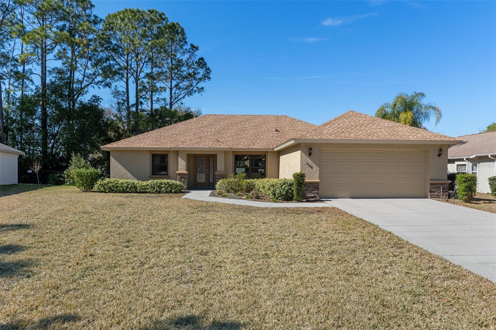 Price reduced!  Bright and sunny 3-bedroom, 2-bath home that has been immaculately maintained. This residence features a large living room with tile flooring, crown molding, recessed lighting, and sliding glass doors leading to a screened lanai—ideal for indoor/outdoor living. The well-appointed kitchen offers granite countertops, tall cabinets, stainless steel appliances, large pantry, dining area and a breakfast nook.

The split-bedroom layout includes two guest bedrooms and a guest bath, with plush luxury carpeting in all bedrooms. Additional highlights include a separate laundry room with laundry tub and a large 2-car garage.

Enjoy the ultimate carefree lifestyle with lawn mowing, edging and trimming, irrigation, lawn pest control, exterior house painting every 6-7 years, roof replacement every 20 years and more included. Ownership also provides access to the Citrus Hills Social Membership, featuring resort-style amenities, restaurants, pools, fitness centers, activity centers, Brentwood's own heated pool and the new Davis Reserve perks and amenities. Conveniently located with easy access to shopping, grocery stores, and the new Suncoast Parkway extension, making travel and daily errands a breeze. Don't forget high and dry in a non-flood zone!