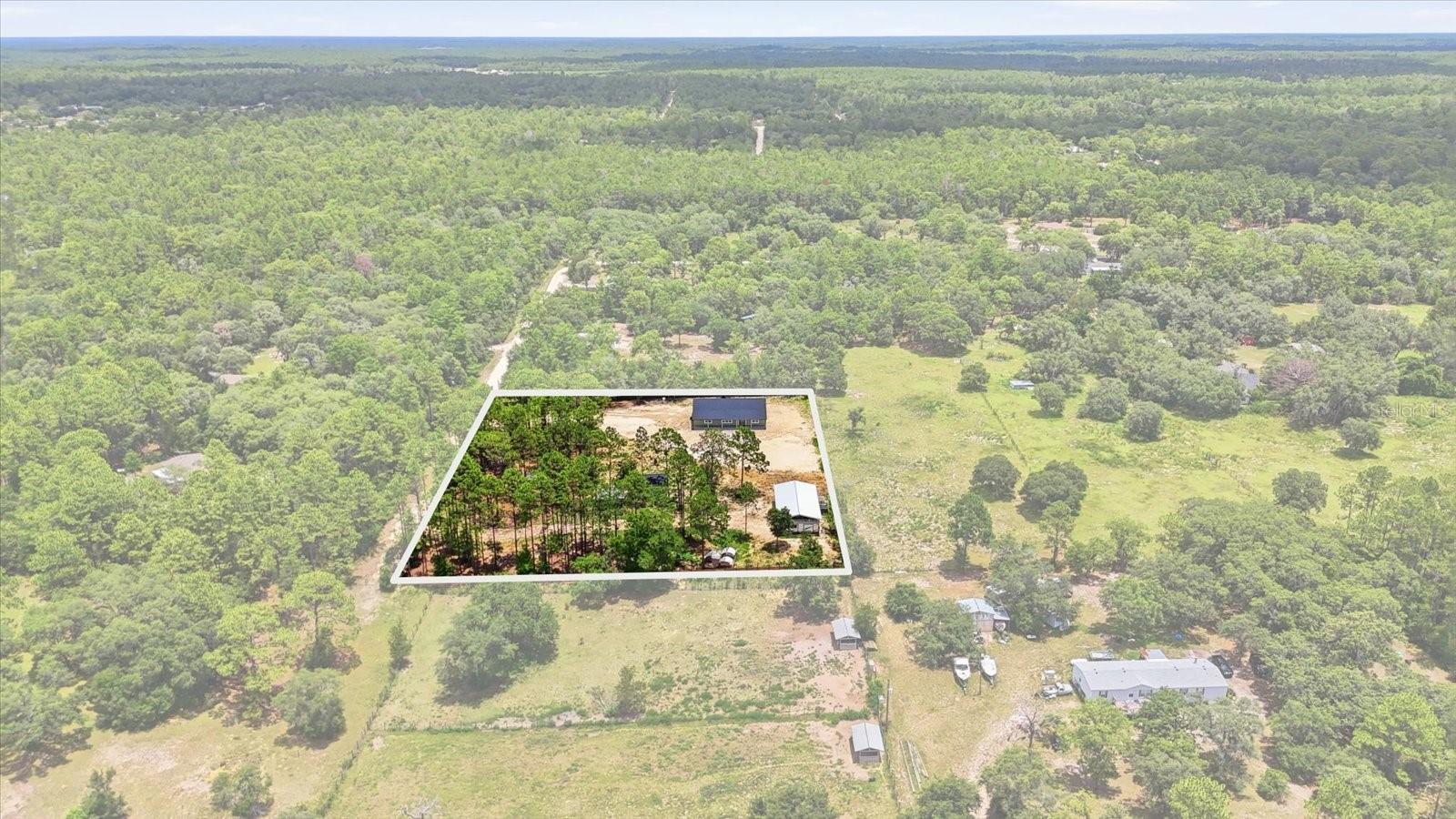 The freedom of owning land everyone wants starts here.
 This brand-new mini farm sits on 2.64 unrestricted acres, offering the space and flexibility to enjoy country living with all the benefits of new construction.
The home features 2,550 square feet of living space with 3 bedrooms, 4 full bathrooms, luxury tile flooring throughout, high-quality appliances, and a cement safe in the primary suite. Two separate entrances and a fully fenced property provide added convenience and versatility.
Designed for a country lifestyle, the property includes chickens and goats, a 40' x 60' pole barn, and a 21' x 16' shed with double doors and a 5,000-watt solar panel system. Also included is a new Salem Hemisphere travel trailer, adding even more value and flexibility for guests, travel, or additional living space.
With no deed restrictions, there is room for RVs, boats, trailers, equipment, and future projects. The seller is offering $20,000 toward closing costs with a reasonable and acceptable Price.
This move-in-ready mini farm offers a rare opportunity to enjoy space, freedom, and modern living all in one exceptional property.
