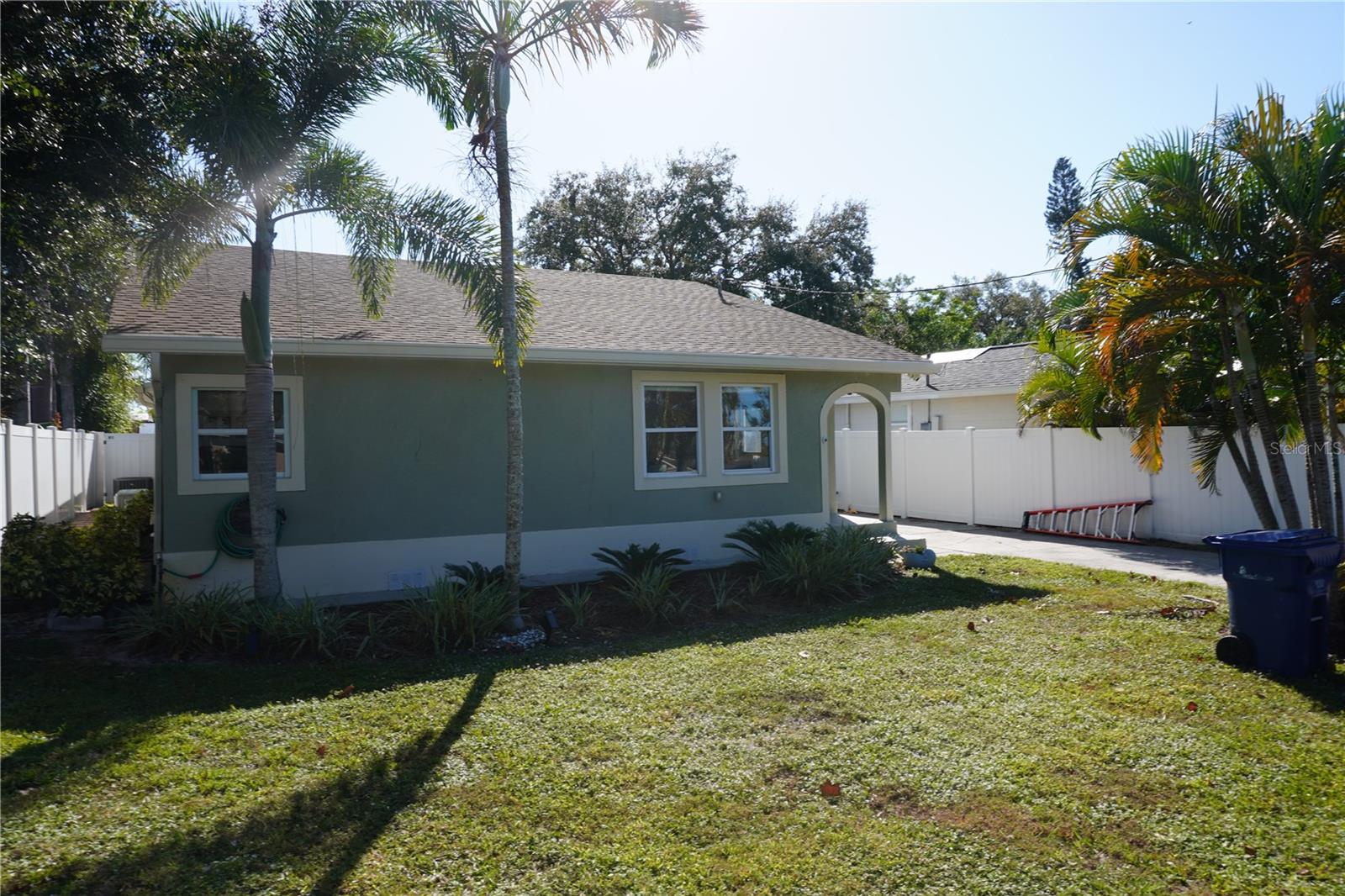 Recently updated throughout, this 3 bedroom, 2 bath home is move-in ready. The home has been fully renovated, including new flooring and a new roof installed in October 2024. A peaceful serenity in a lush private back yard oasis is accessed by the new impact-glass slider door. A new Trex deck with a sunshade and bistro LED lights for entertaining guests or lounging around the fire pit entices all.

When you walk through the front door you see vaulted ceilings, an electric fireplace, and updated flooring. Newer kitchen with shaker cabinets, granite counters, and stainless appliances. A new washer and dryer are steps away in the spacious laundry room. The master bedroom has a new closet organizer for more efficiency and plenty of space for a king-sized bed. The 3rd bedroom with a loft is currently used as an office/library.

There is newer central air, as well as a mini-split A/C system upgrade new in 2021. New R-38 insulation was installed in 2021. Detached 22x22 garage with newer garage door. This home has county water as well as sewer, with a well for irrigation.

Location is prime—restaurants, shopping, banks, churches, medical, schools, minutes to Siesta Key beaches and downtown Sarasota to enjoy the many cultural events.