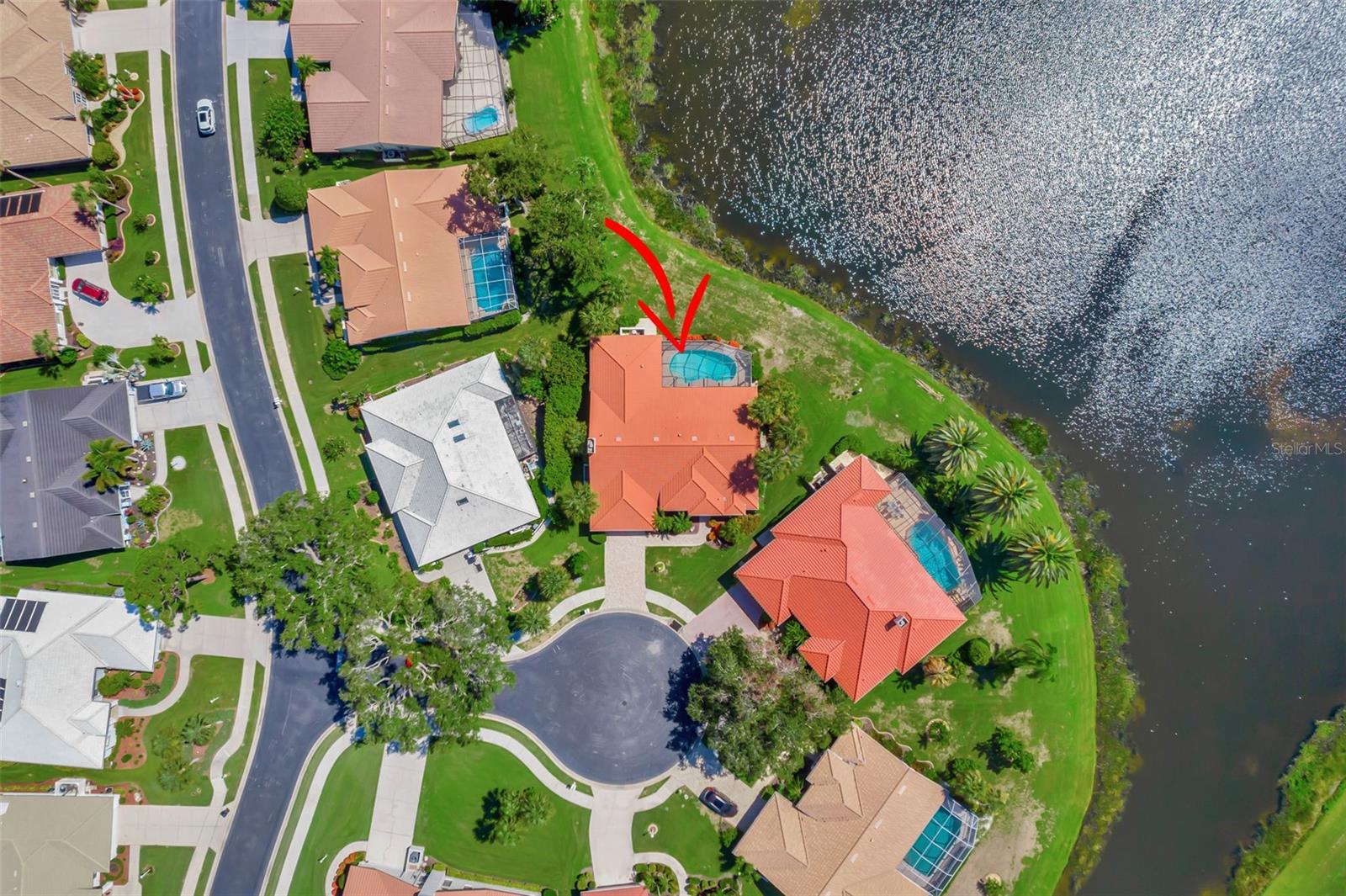 PRICE IMPROVED!!Welcome to your spacious dream Florida pool home featuring 3 bed/2 bath/2-car garage split floor plan, boasting stunning water views and abundant natural light through glass sliders throughout. Located in Windsor, a gated community within the coveted Waterford Golf Community in Venice.  
Enter the home to first be greeted by an open layout: to the left, a formal dining room; straight ahead, a living room with pool and lake views through tall glass sliders; and to the right, the large primary bedroom boasting high ceilings, a reading/sitting area, and double sliders to the pool area with serene water views. The primary bedroom also features two large walk-in closets with pocket doors and an ensuite bathroom with his and hers sinks, a walk-in shower, and a separate jetted tub.
Additional bedrooms are located on the opposite side of the home, each with spacious walk-in closets and refreshed carpeting. The guest bathroom has been recently updated with a retiled shower with glass doors, new hardware, and fresh paint.
The kitchen is updated with all new stainless-steel appliances, lighting, faucet, disposal, ample cabinets and freshly painted, complemented by a breakfast area overlooking scenic views. Adjacent is an expansive yet cozy family room with high cathedral ceilings, wood beams, new carpeting, and a wood burning fireplace, ideal for gatherings.
Other highlights include an indoor laundry room with washer, dryer, sink, and ample storage cabinets. Step outside to a caged and screened pool and pool deck with newer pavers, electric hurricane shutters, and enjoy the peace, quiet and stunning sunset views over the sparkling lake, all surrounded by lush landscaping. There’s even room to potentially add an outdoor kitchen. The home is situated in a private cul-de-sac with no immediate rear neighbors.
Updates continue with new lighting, fans, blinds, new carpeting, a 2016 roof, two 2019 water heaters and water softener system, and a 2014 garage epoxy flooring. Exterior painting was completed in 2021, with recent pressure washing and fresh landscaping.
Residents of Waterford enjoy amenities such as the Sport Club Complex with a heated Junior Olympic pool, spa, four tennis courts, fitness center, and social room + pickleball coming soon. The community features 20 lakes and a semi-private 27-hole golf club, without mandatory membership. Offering a low annual HOA fee, it is not in a flood zone, and does not have any CDD fees. 
Located close to Downtown Venice, cultural attractions, shopping, dining, schools, marinas, boating activities, more golf, the new Sarasota Memorial Hospital, the Legacy Trail, and world-famous Gulf of Mexico beaches, this home offers an exceptional lifestyle & is priced to sell!
Contact me today to schedule your showing!